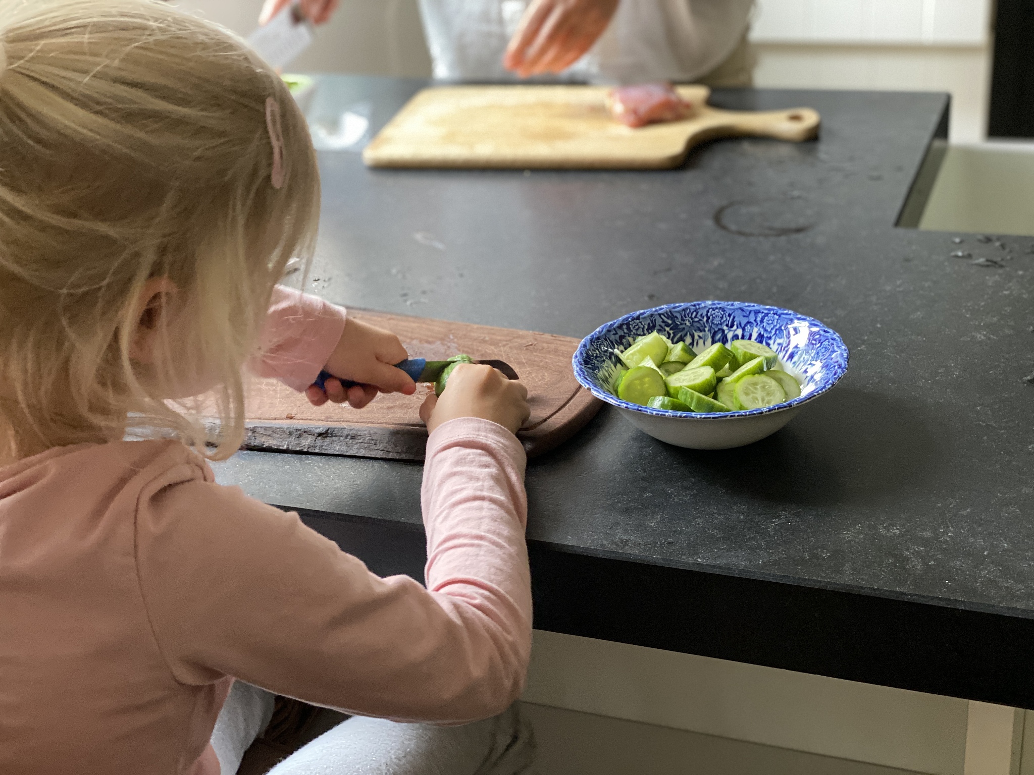 child helping grandmother