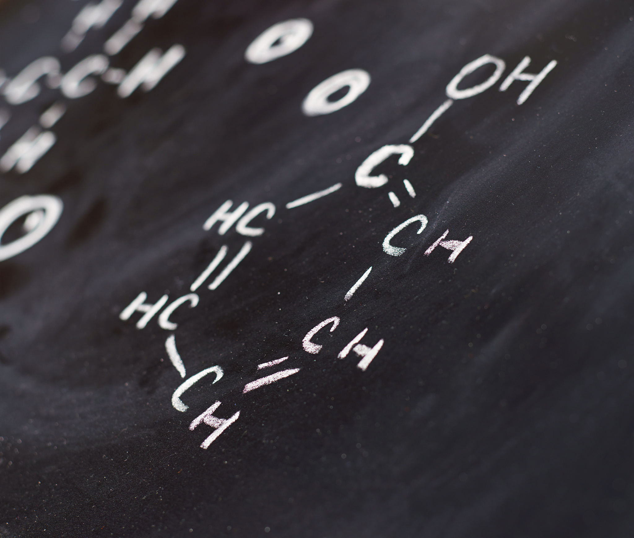 blackboard with some chemistry structures drawn
