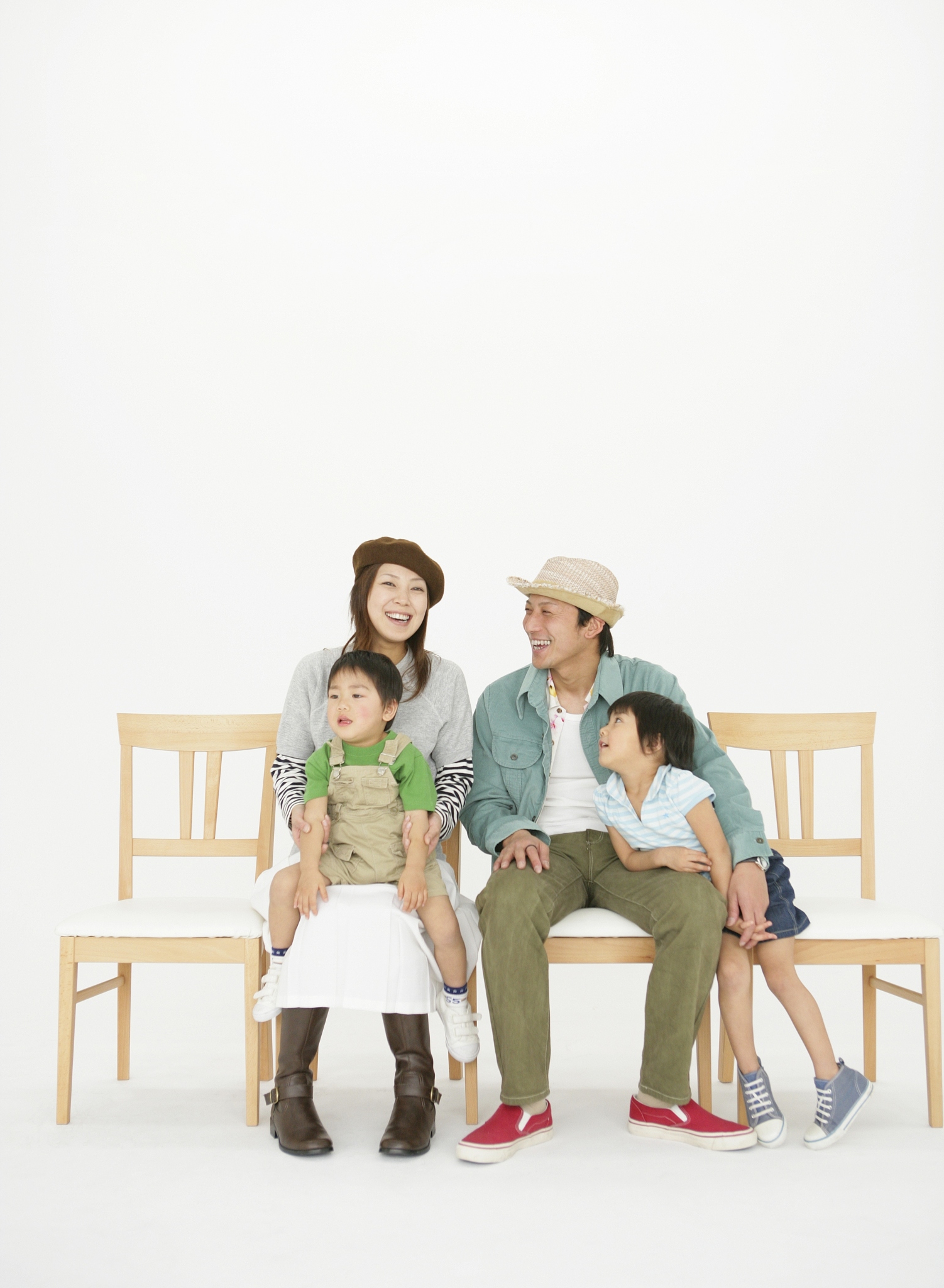 japanese family sitting bench togeter