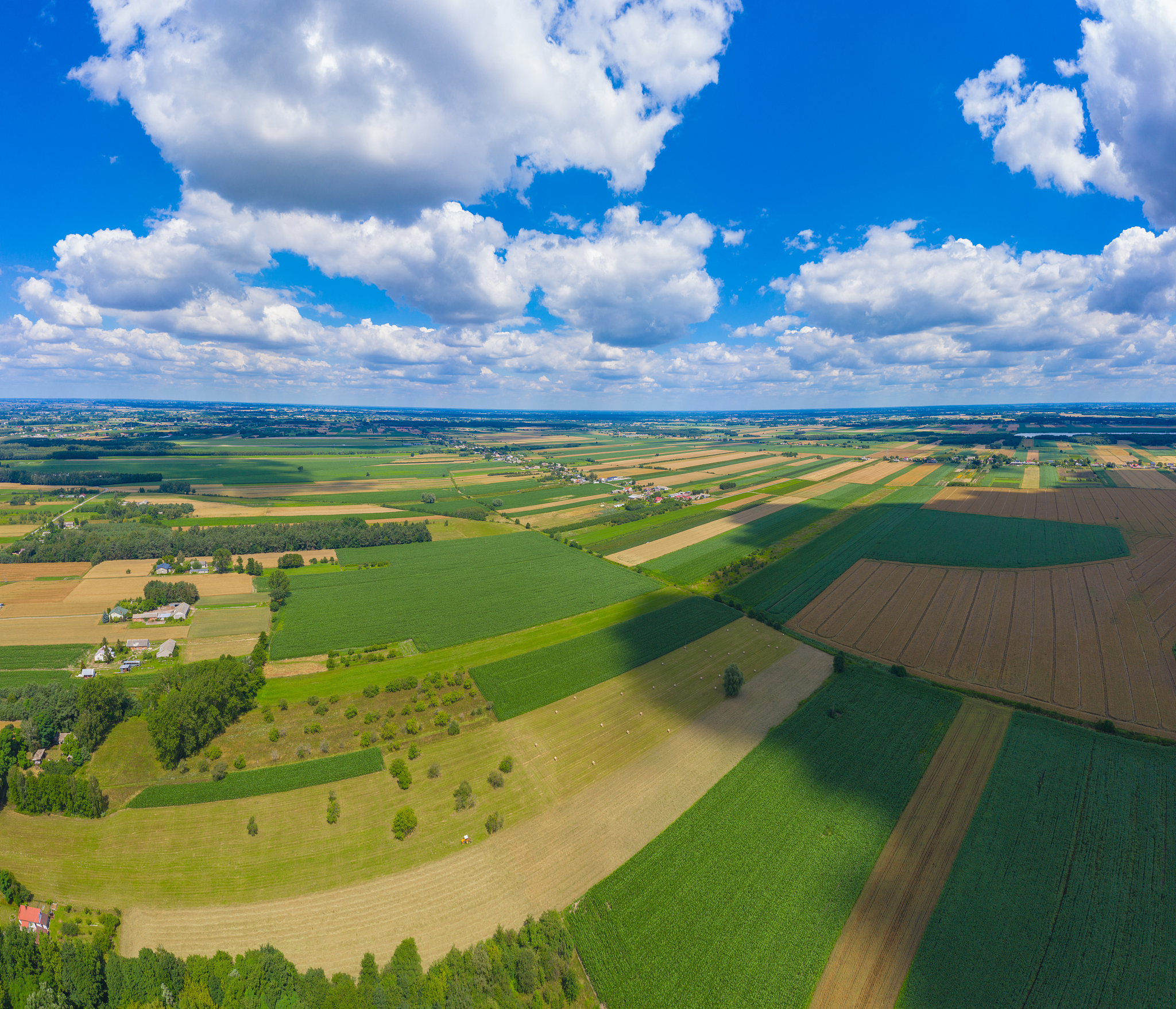 stunning aerial panorama from a drone of countryside, village, g