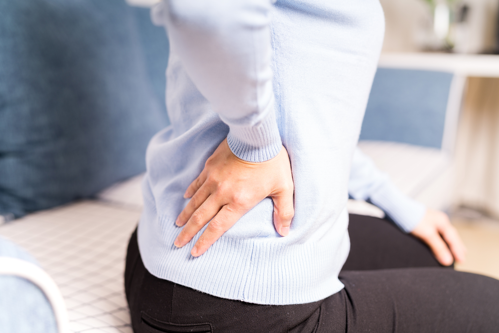 back pain at home. women suffer from backache. healthcare and me