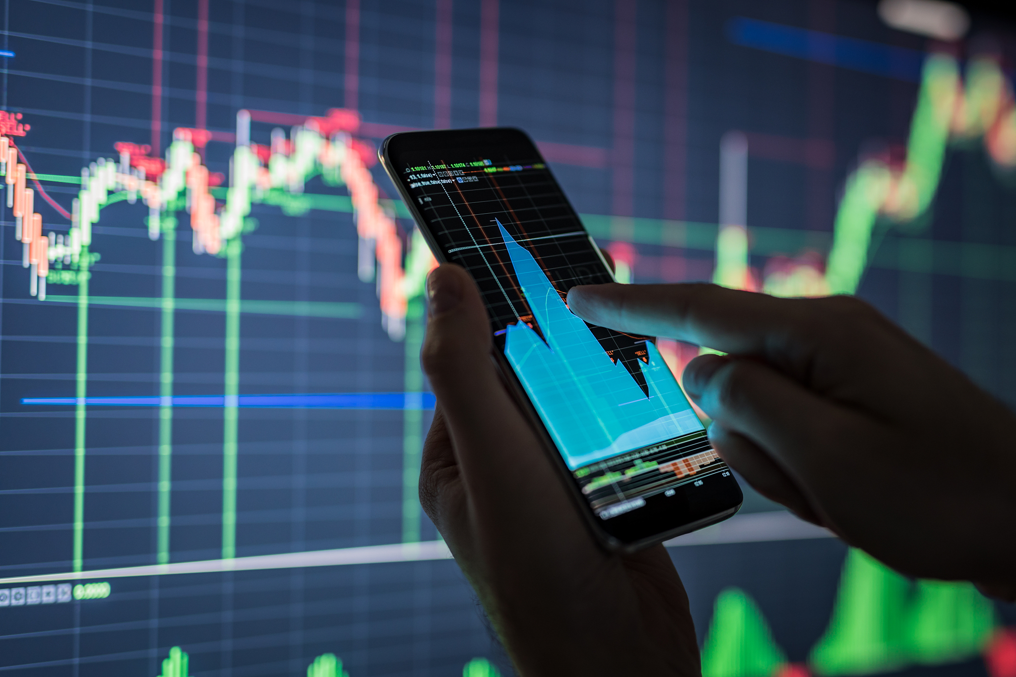businessman checking stock market data.