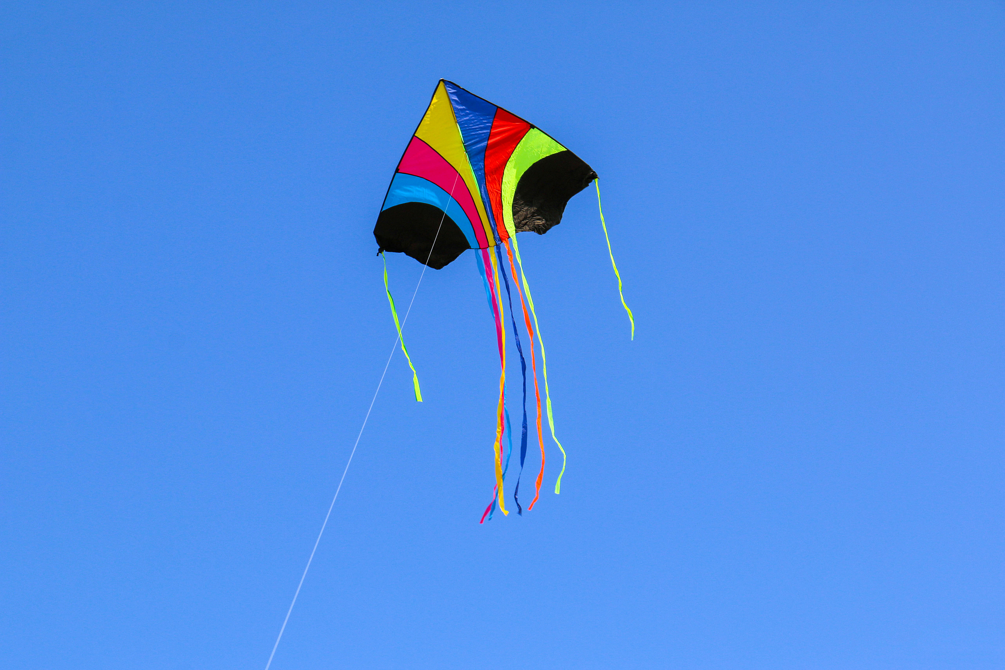 colourful kite flying in the blue sky