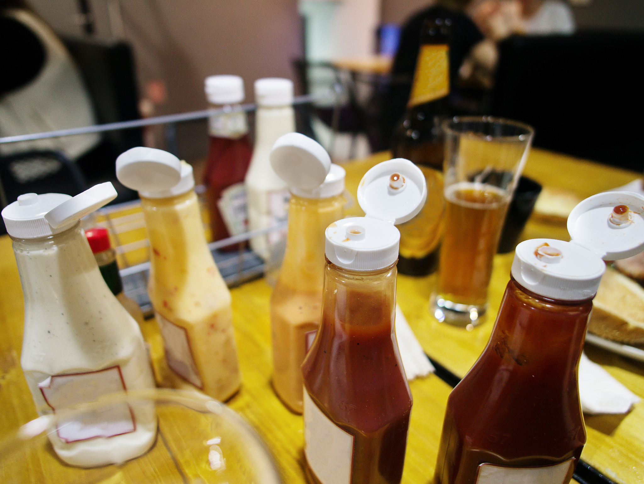 different kinds of sauce on a table