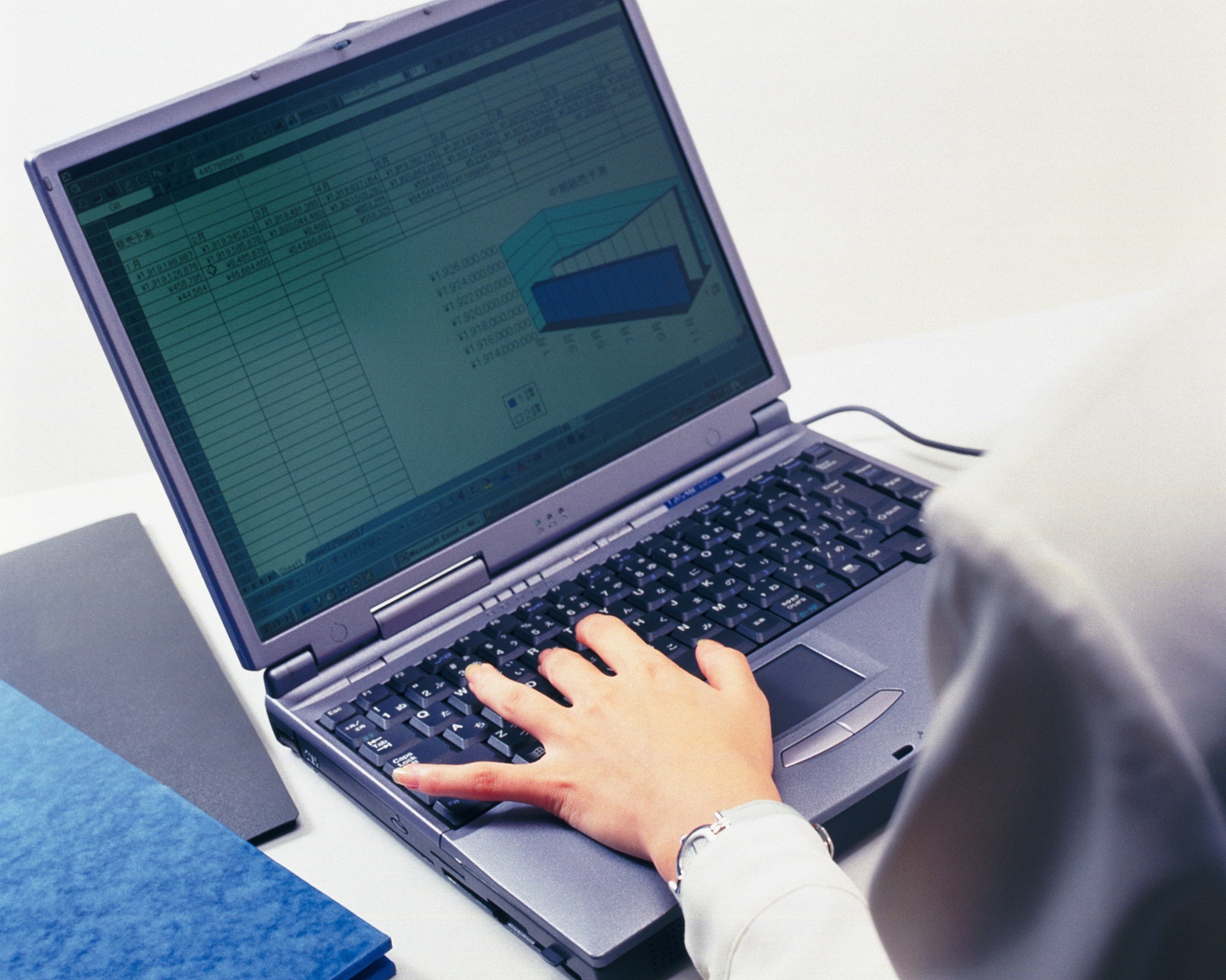 photography of hand typing keyboard at the desk, portrait, high 