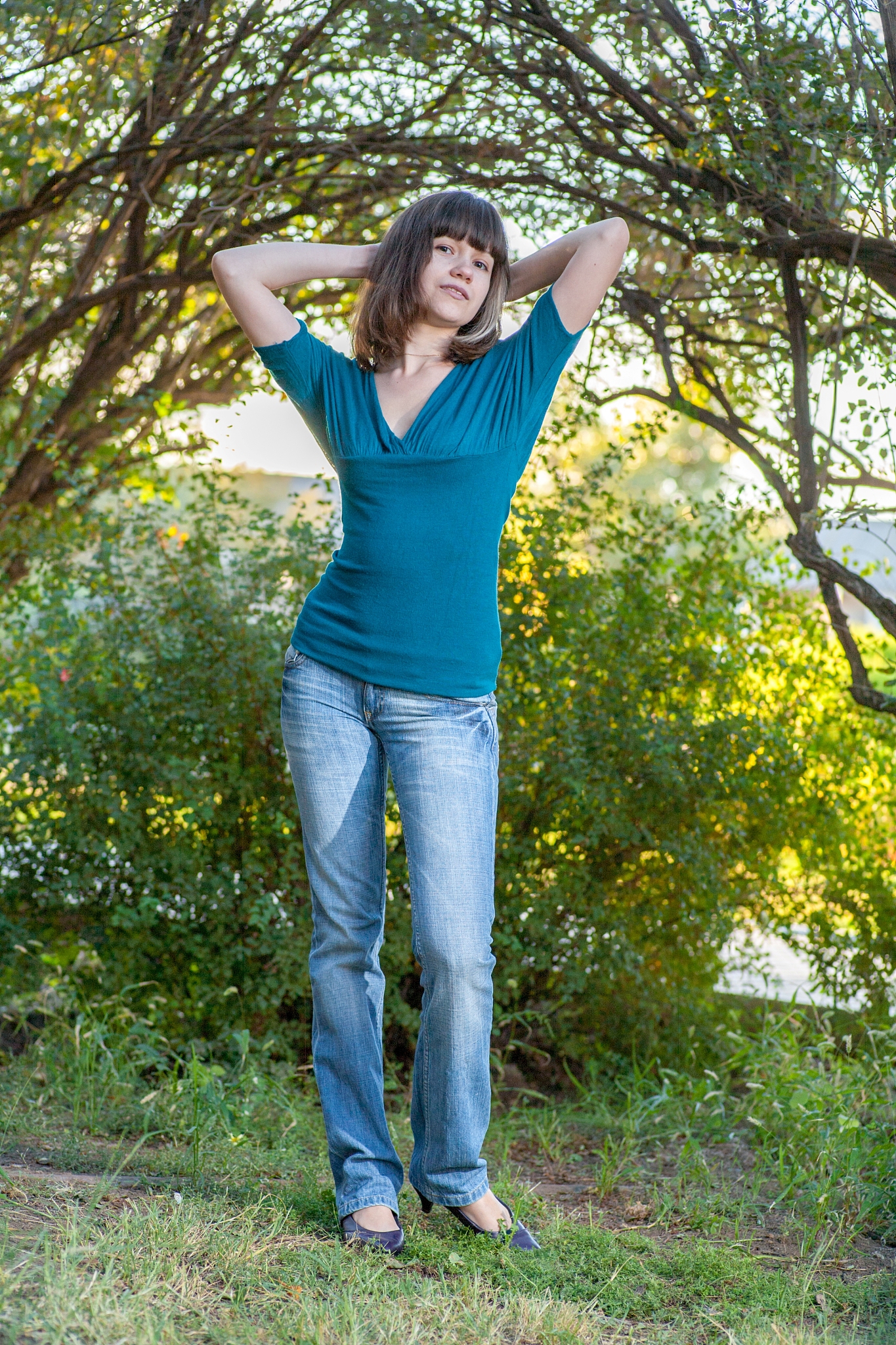 young brunette girl in green