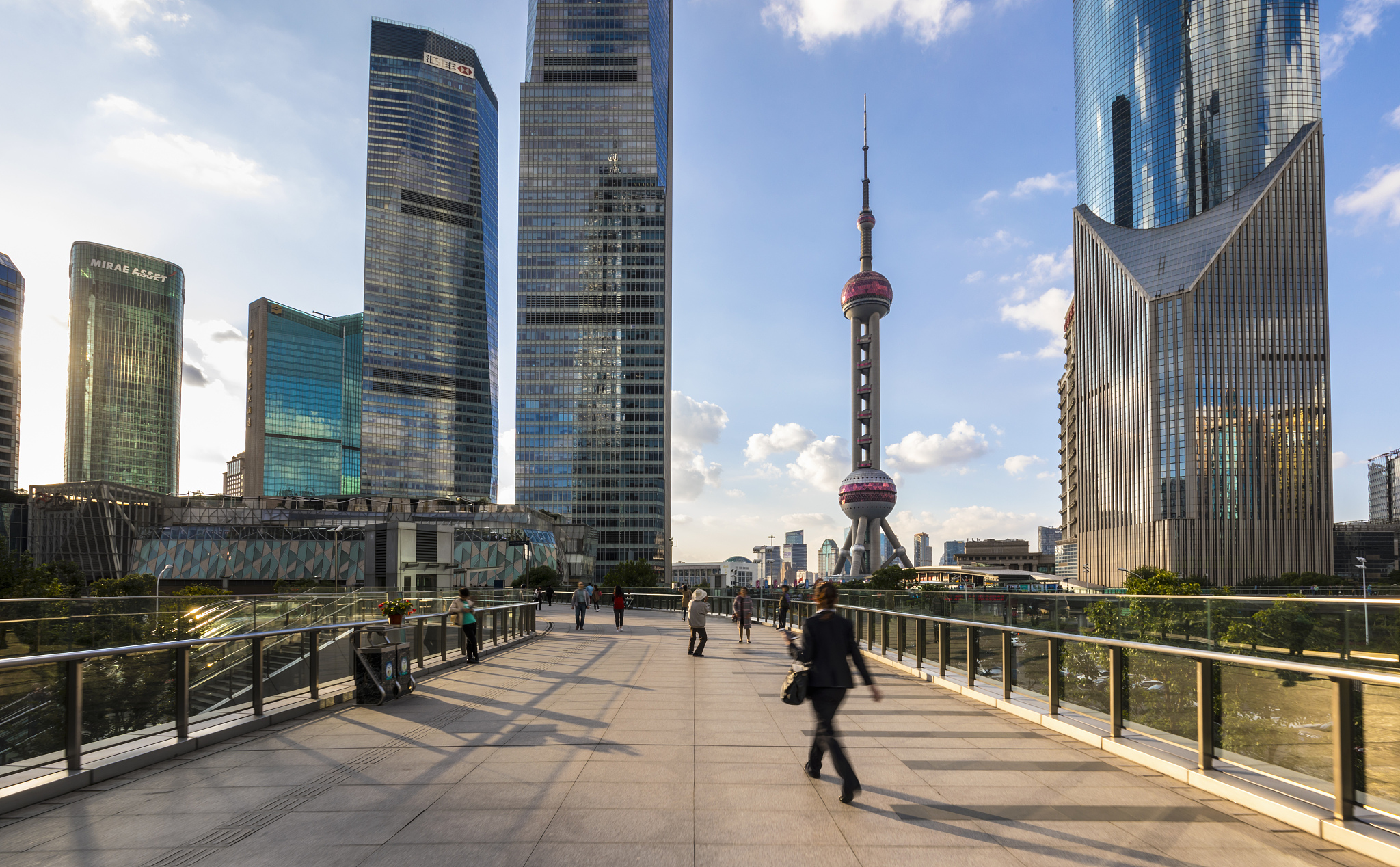 pudong skyline with oriental pearl tower from elevated walkway, 