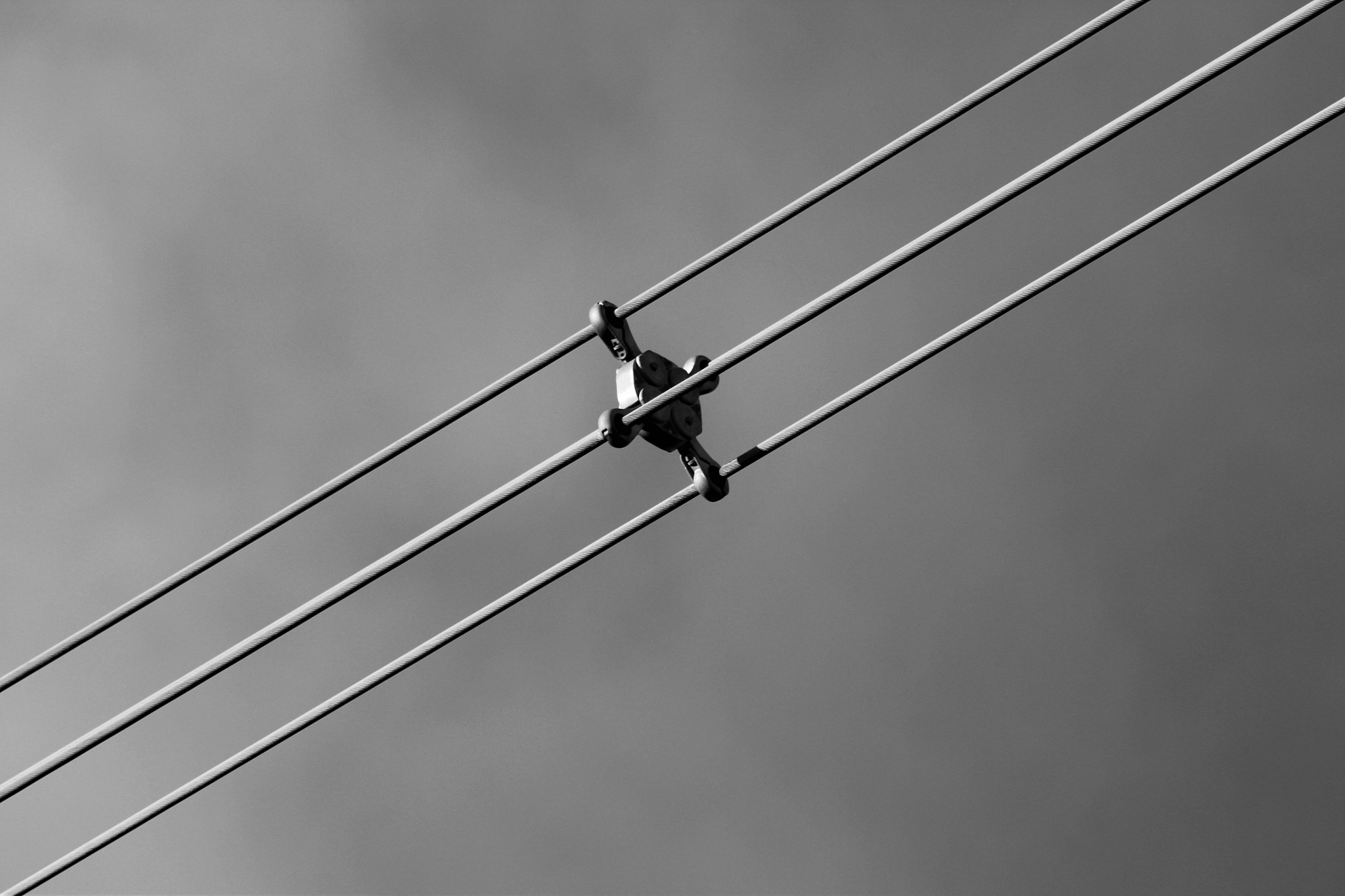 low angle view of cables against clear sky