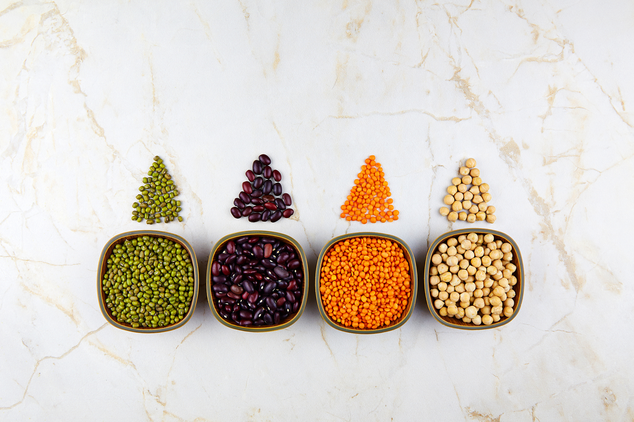 legumes and beans assortment in bowls: lentils, beans, mung and 
