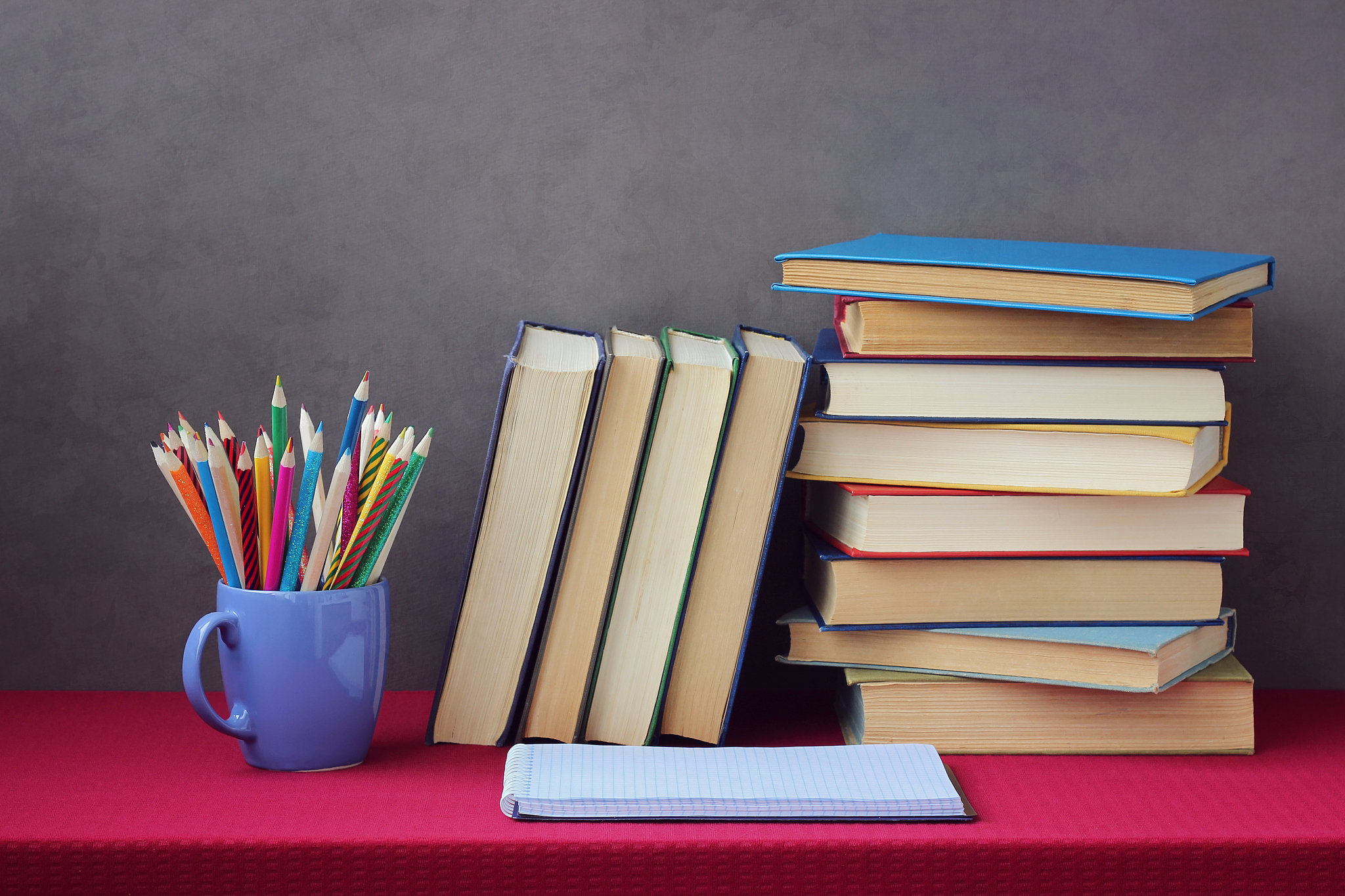 pile of books, colored pencils. education, back to school.