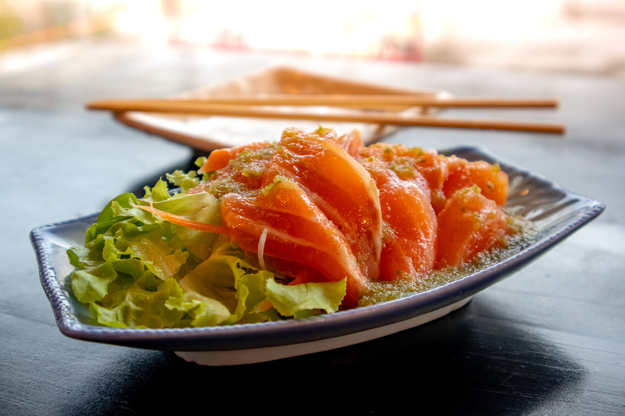 raw salmon, spicy salad (japanese food)