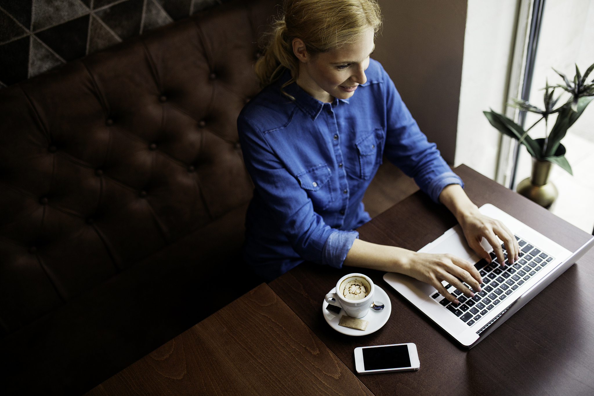 beautiful female working on a laptop
