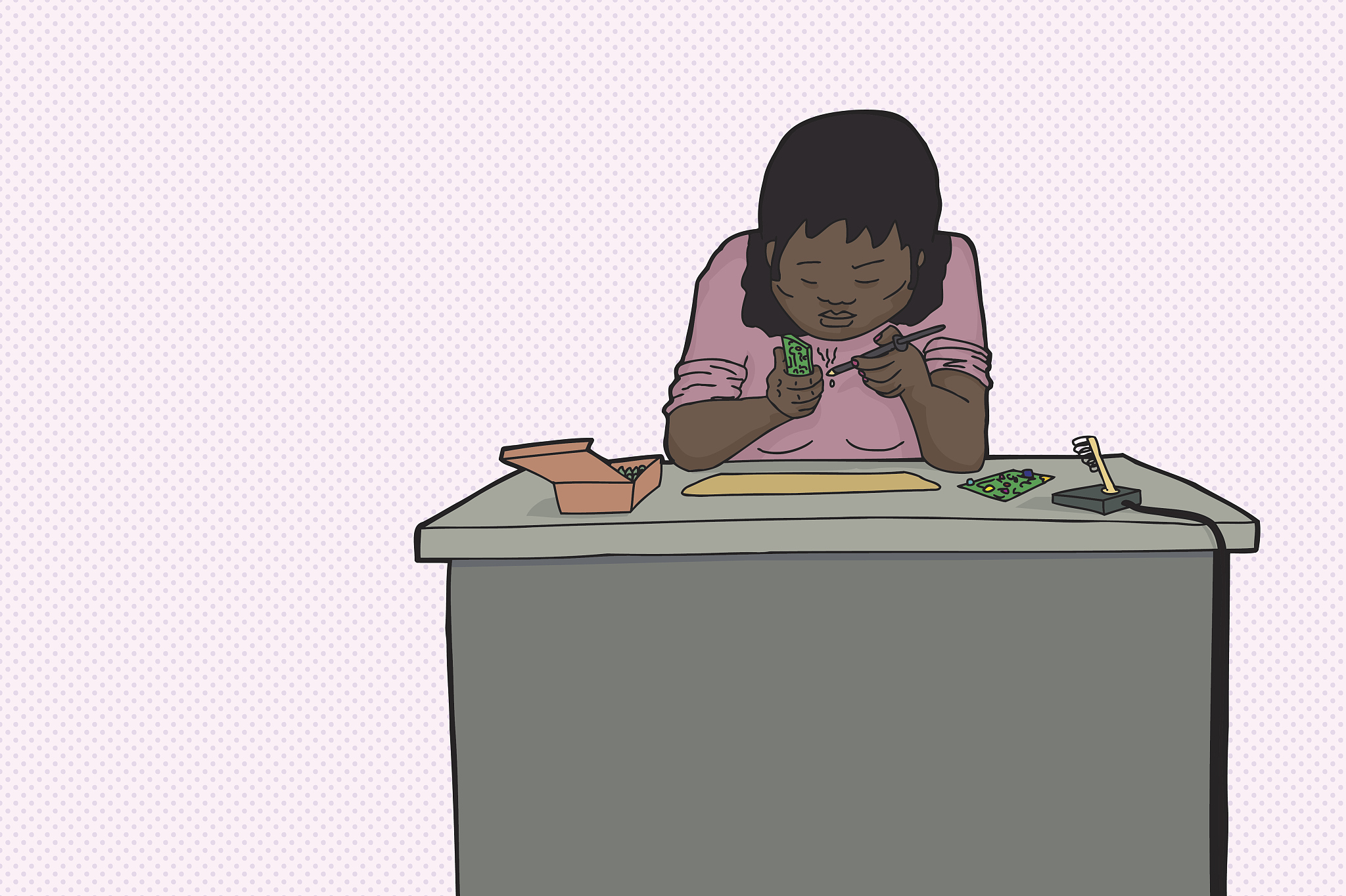 woman using soldering iron