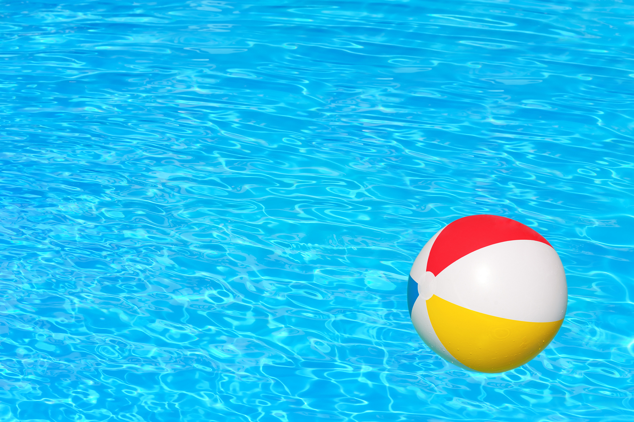 inflatable ball in swimming pool