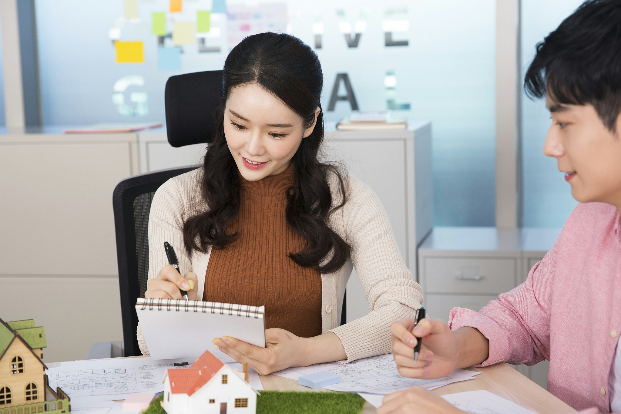 office life concept, two asian business partners working in offi