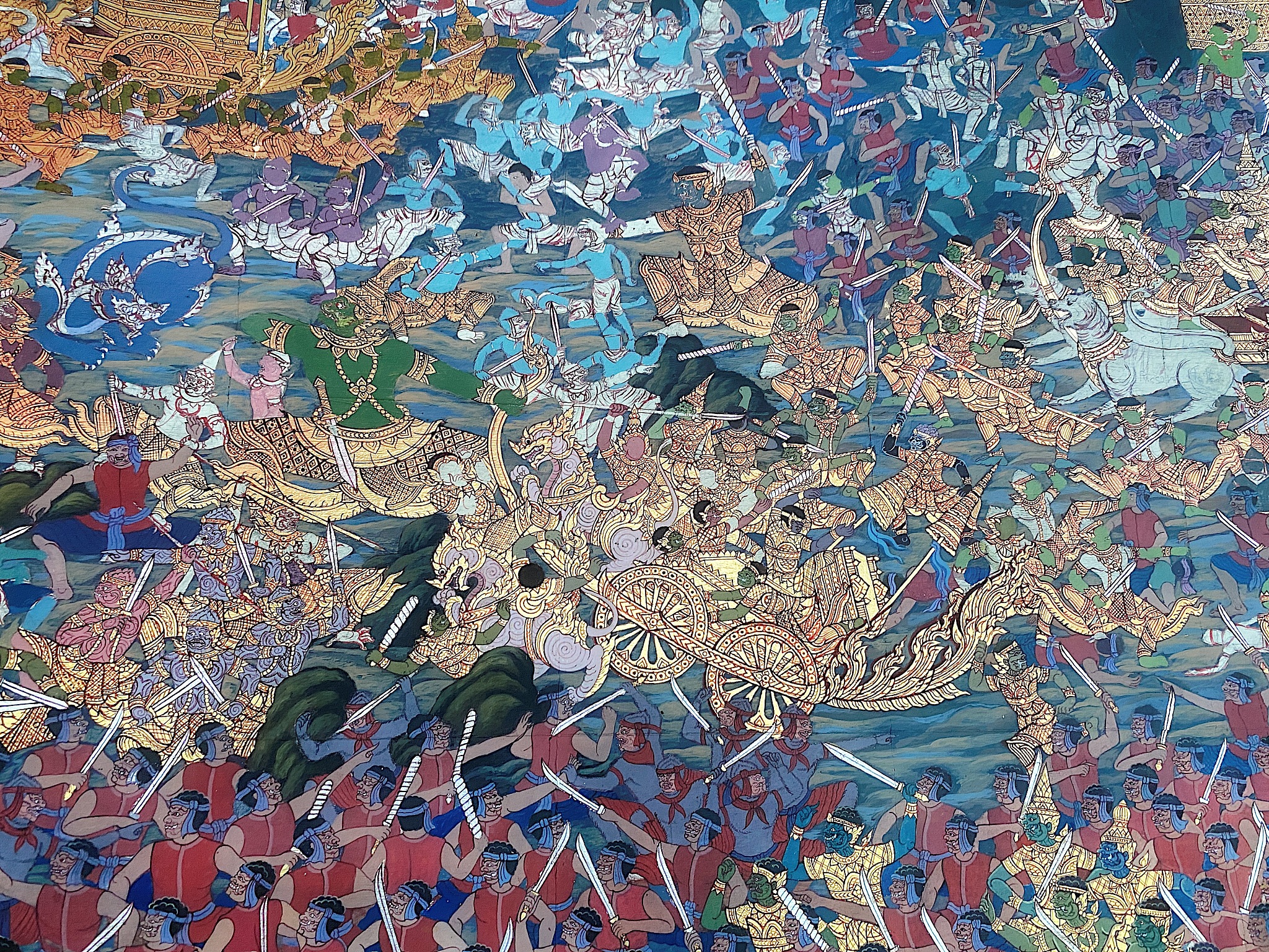 traditional thai mural at wall of thai temple.
