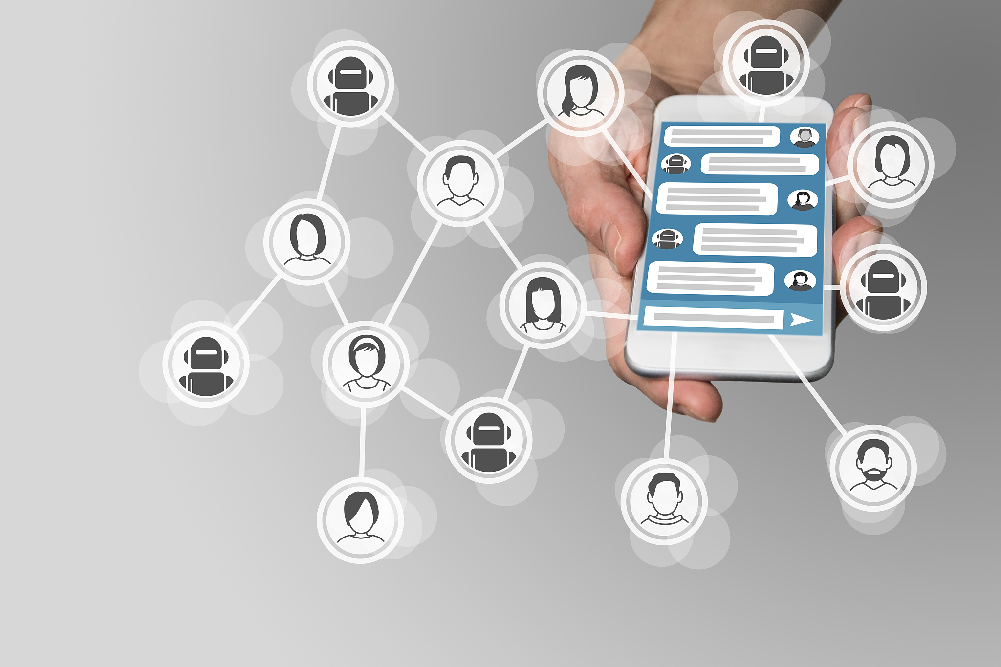 chatbot concept with instant messenger displayed on smart phone
