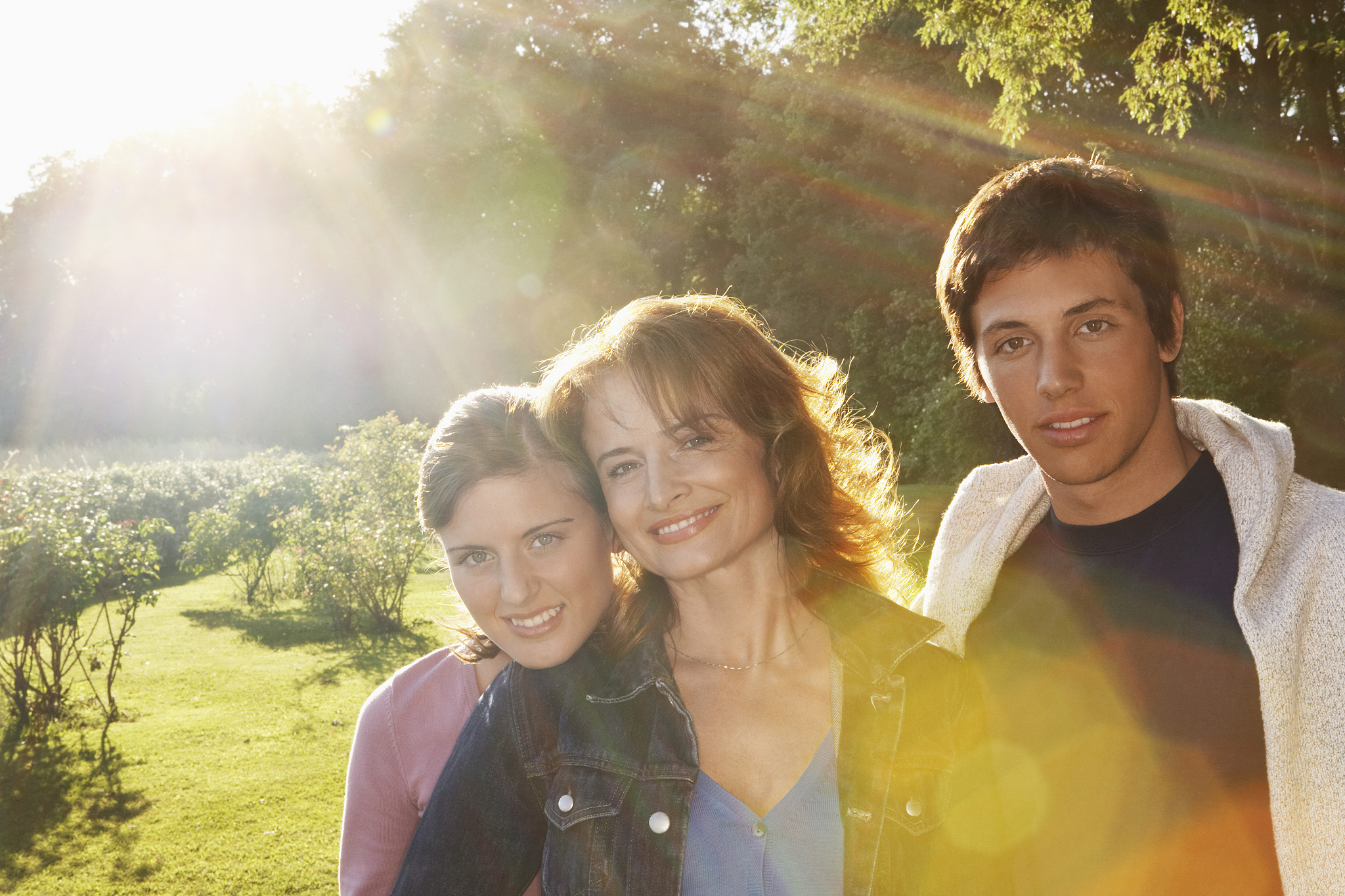 woman standing with her children