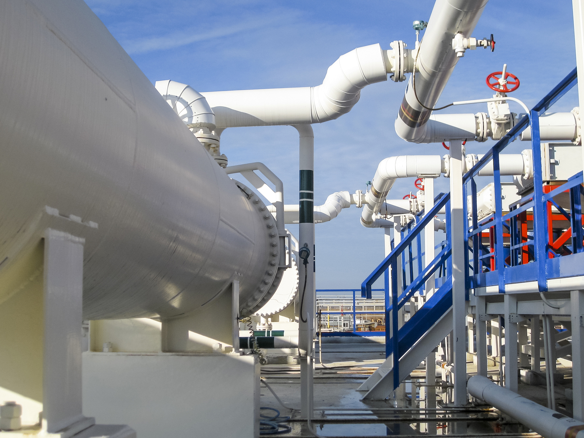 heat exchangers in a refinery. heated gasoline air cooler. the e