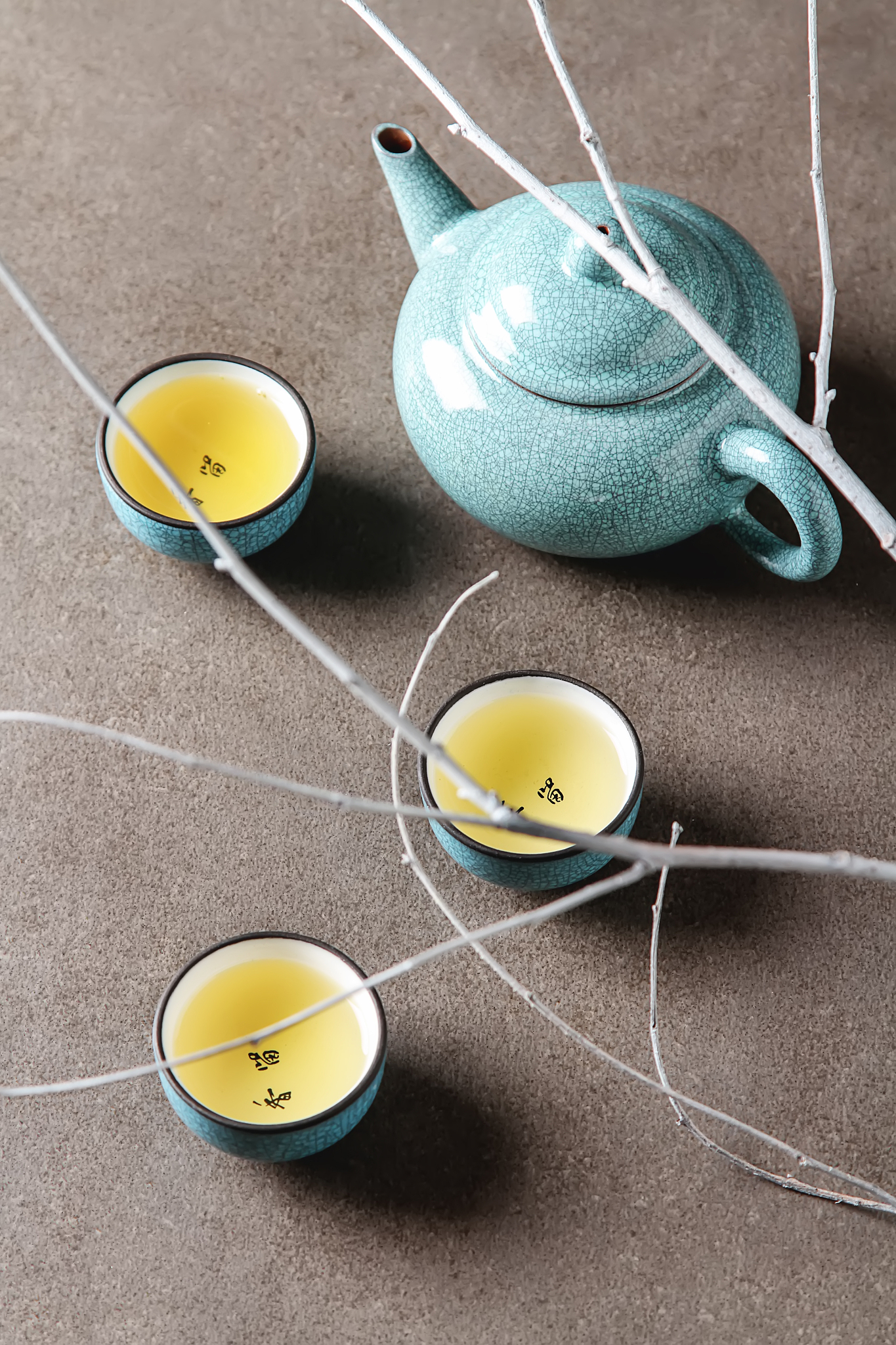 porcelain chinese cups, steel teaspoon. black, green, puerh, ool