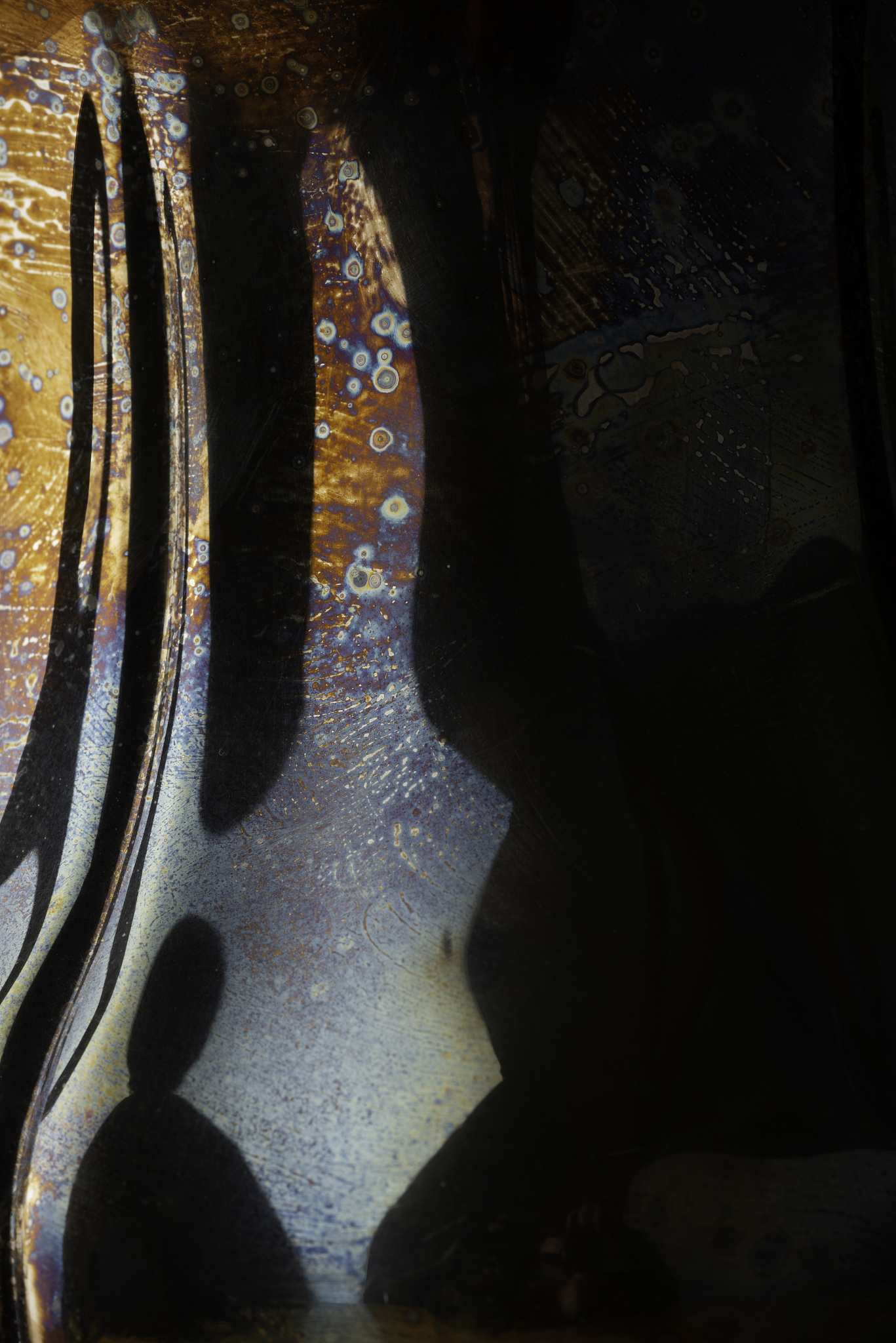 patina on silver pitcher