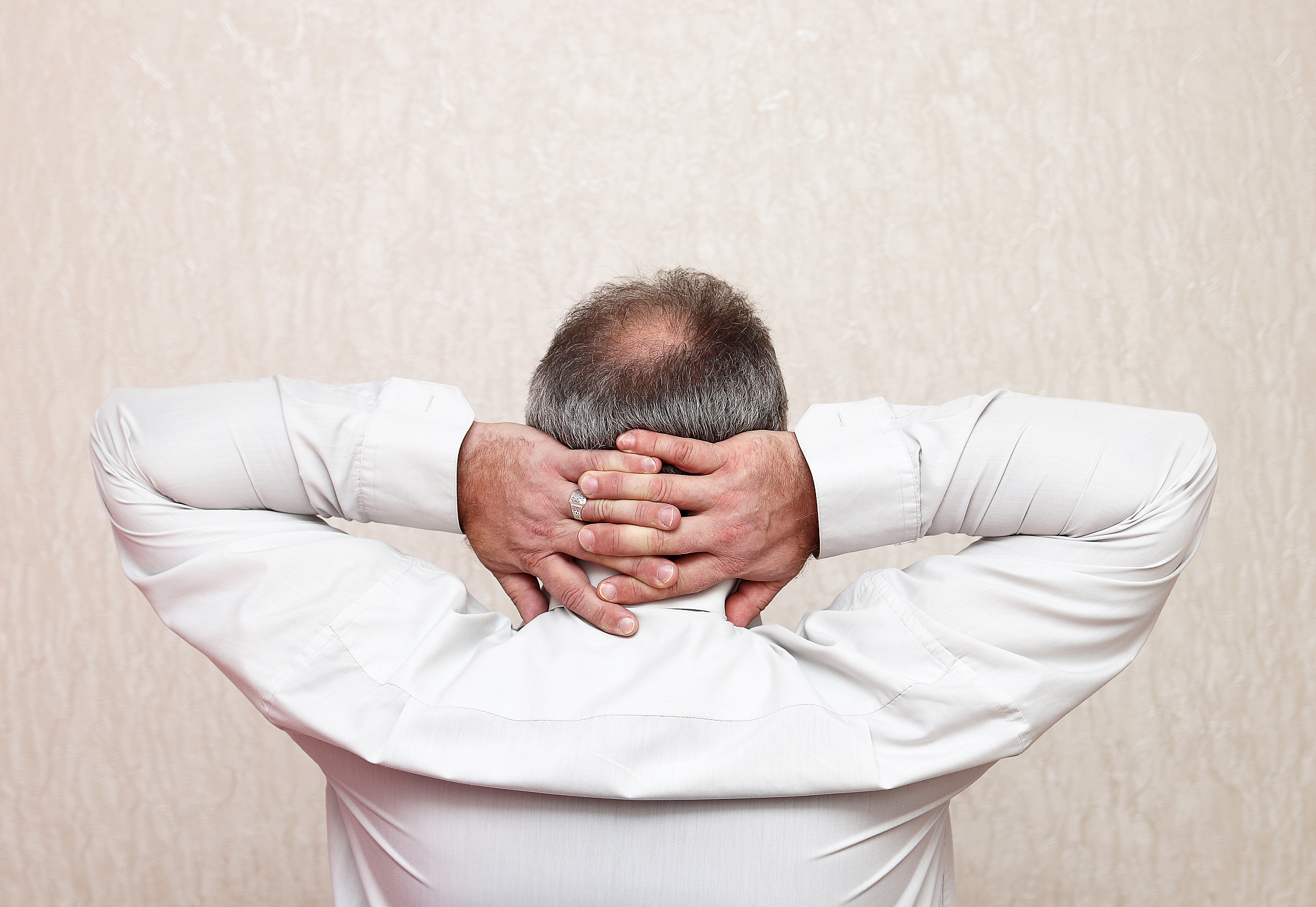 mature balding tired office worker
