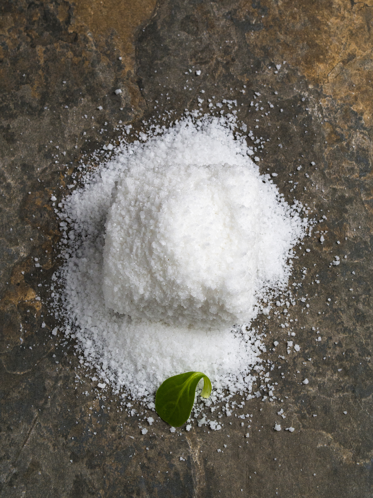 block of salt on brown background