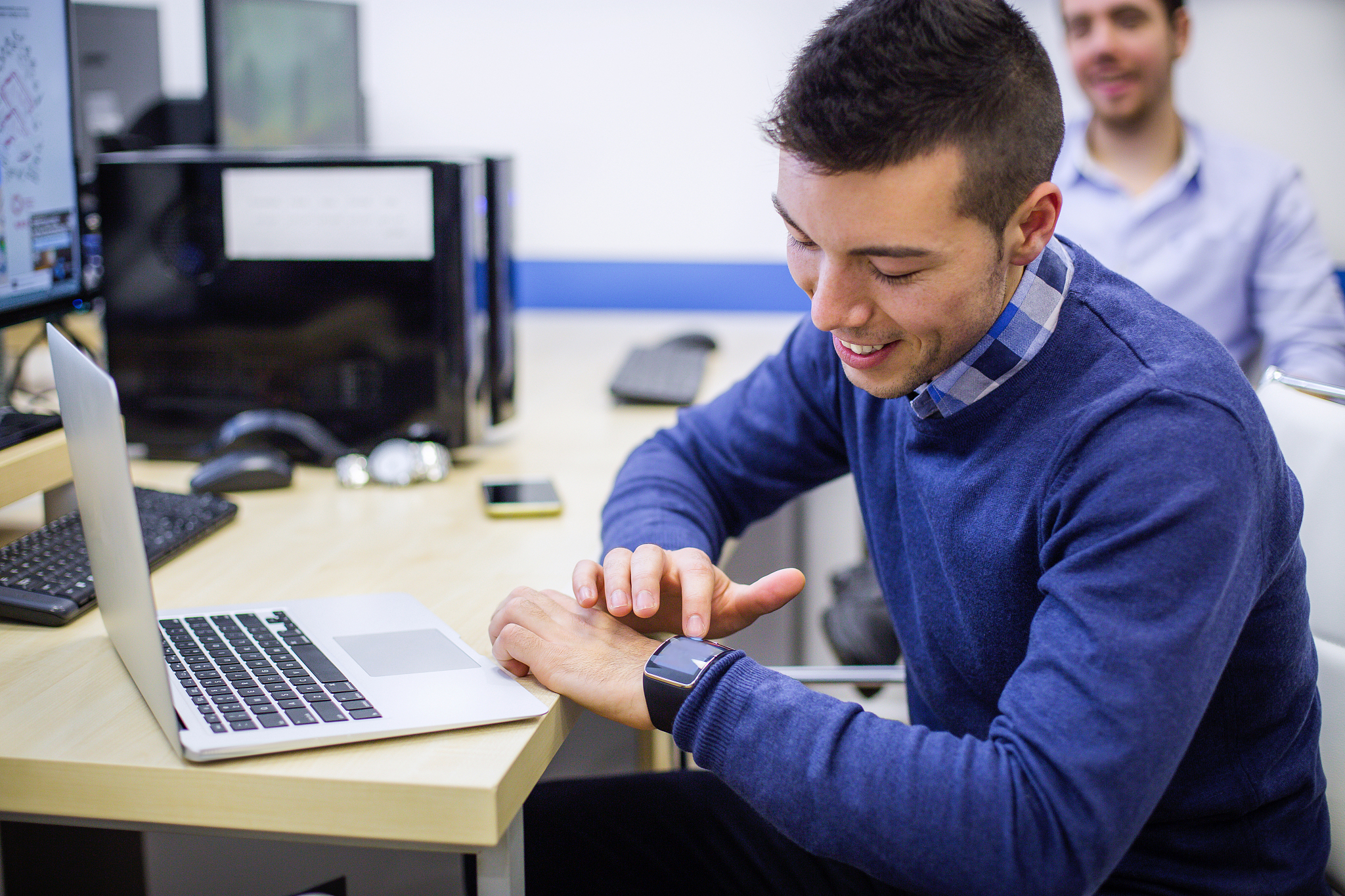 businessman using smart watch