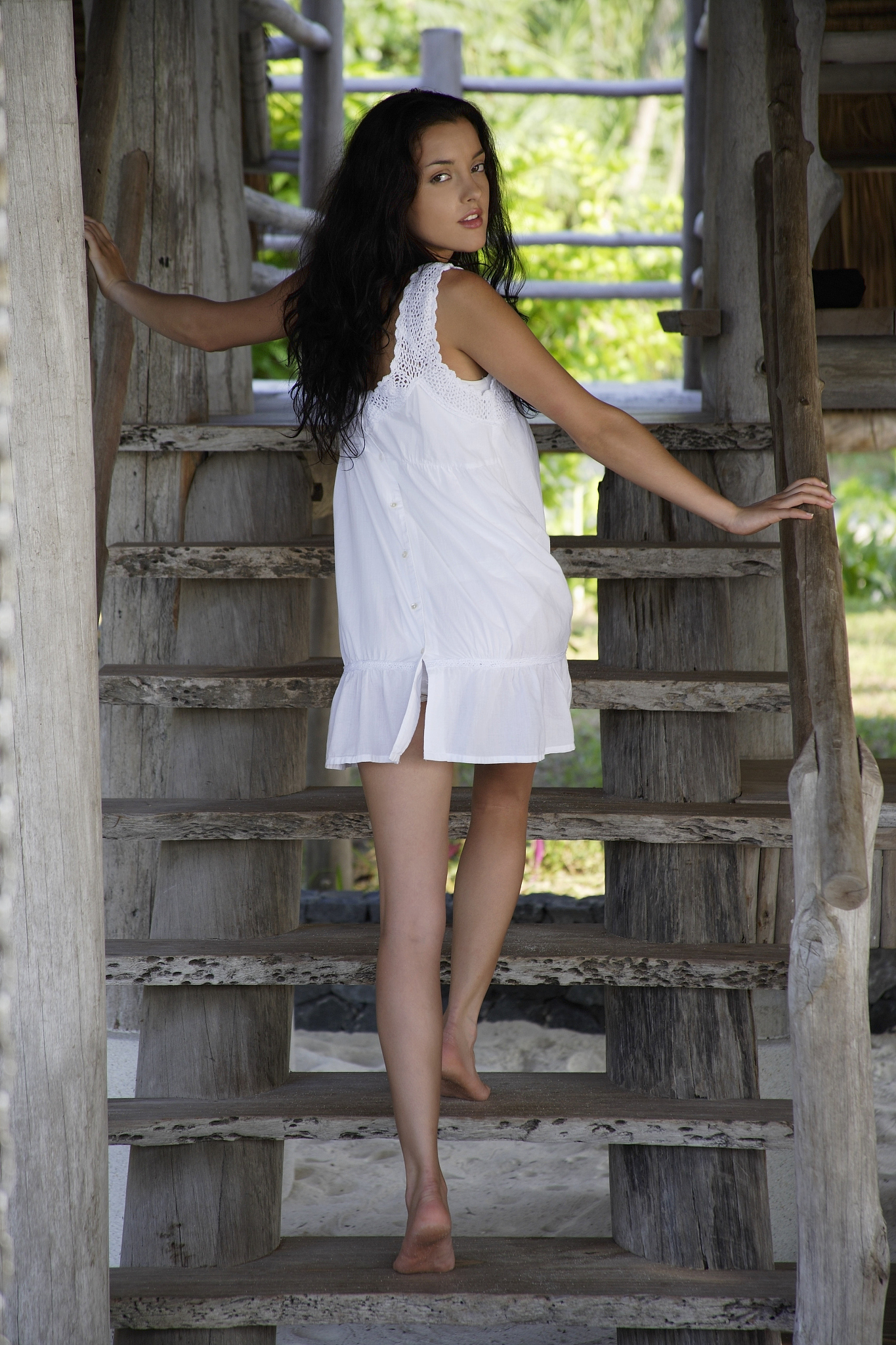 young woman running up bedroom stairs