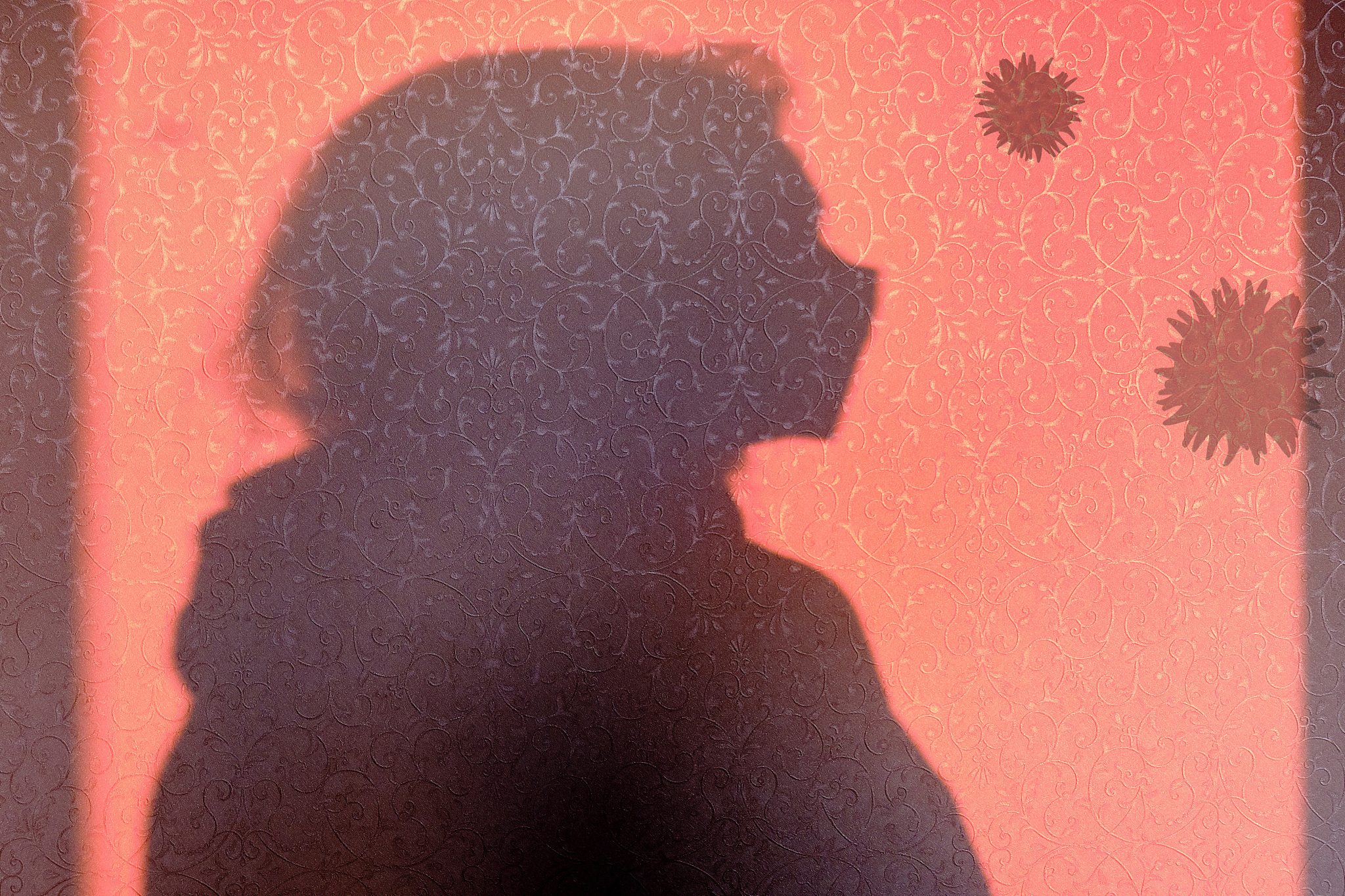 shadow of a woman in a medical mask during the coronavirus epide
