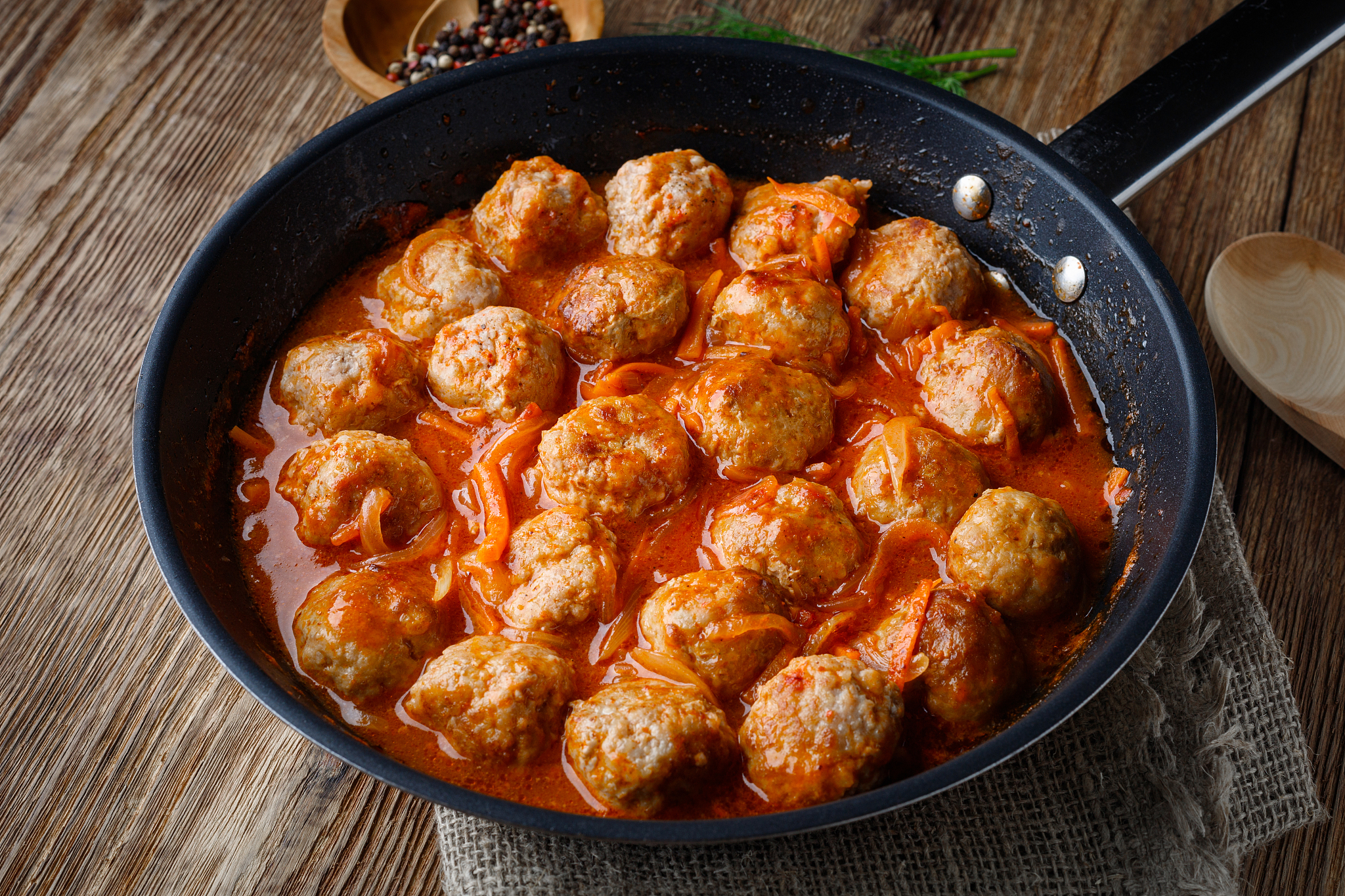 meatballs in a pan in tomato sauce