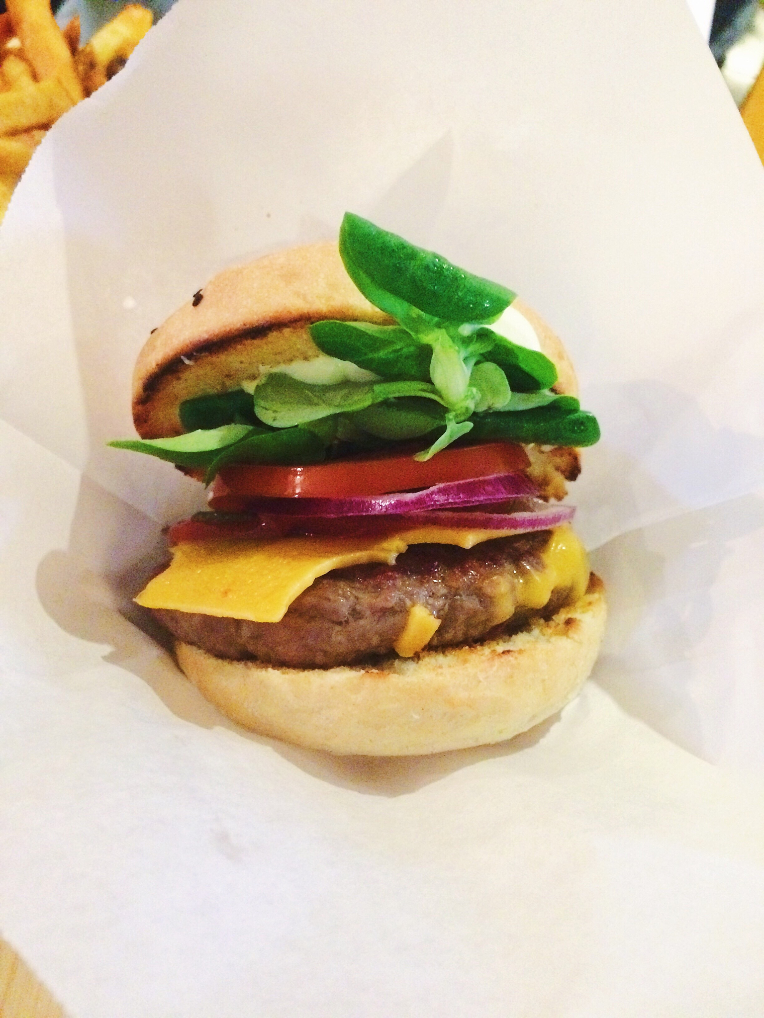 close-up of hamburger on paper