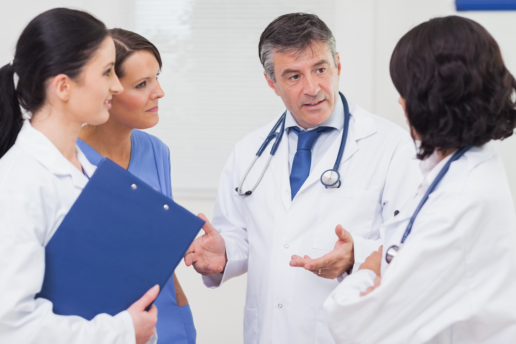 doctor and nurse talking seriously
