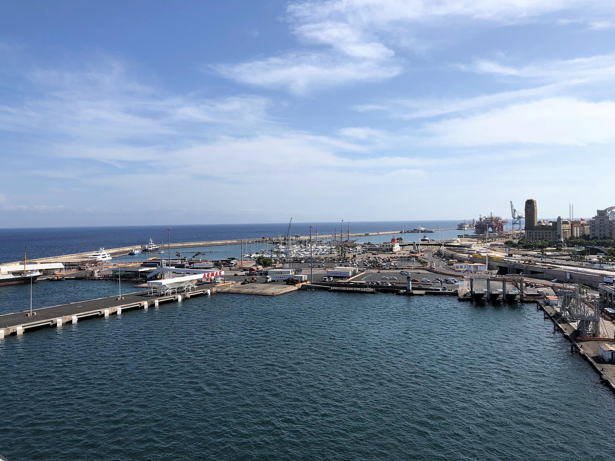 panoramic view of city by sea against sky