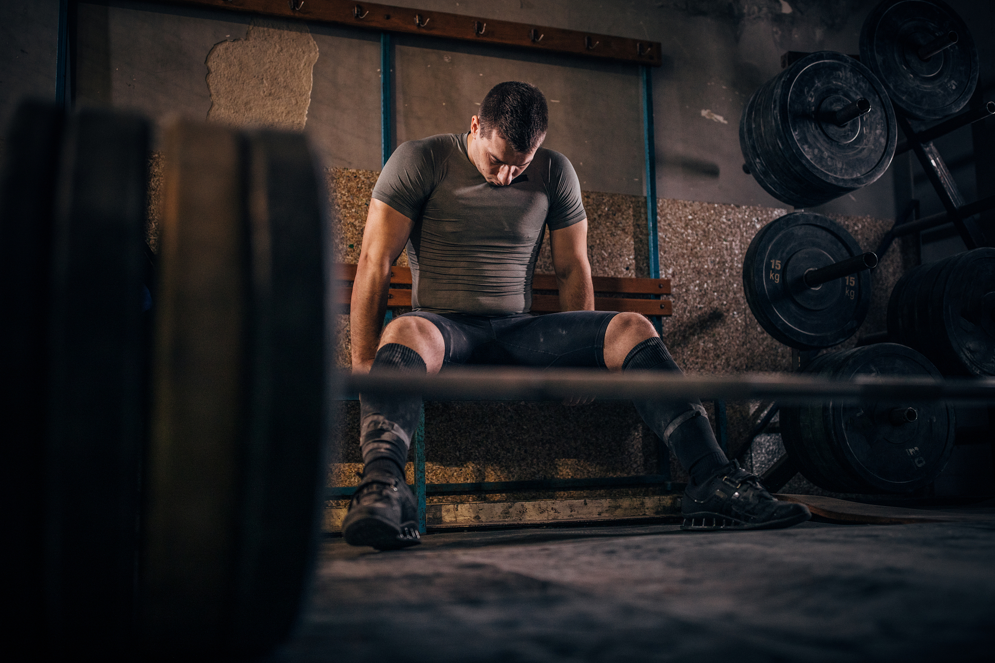 weightlifter resting after training