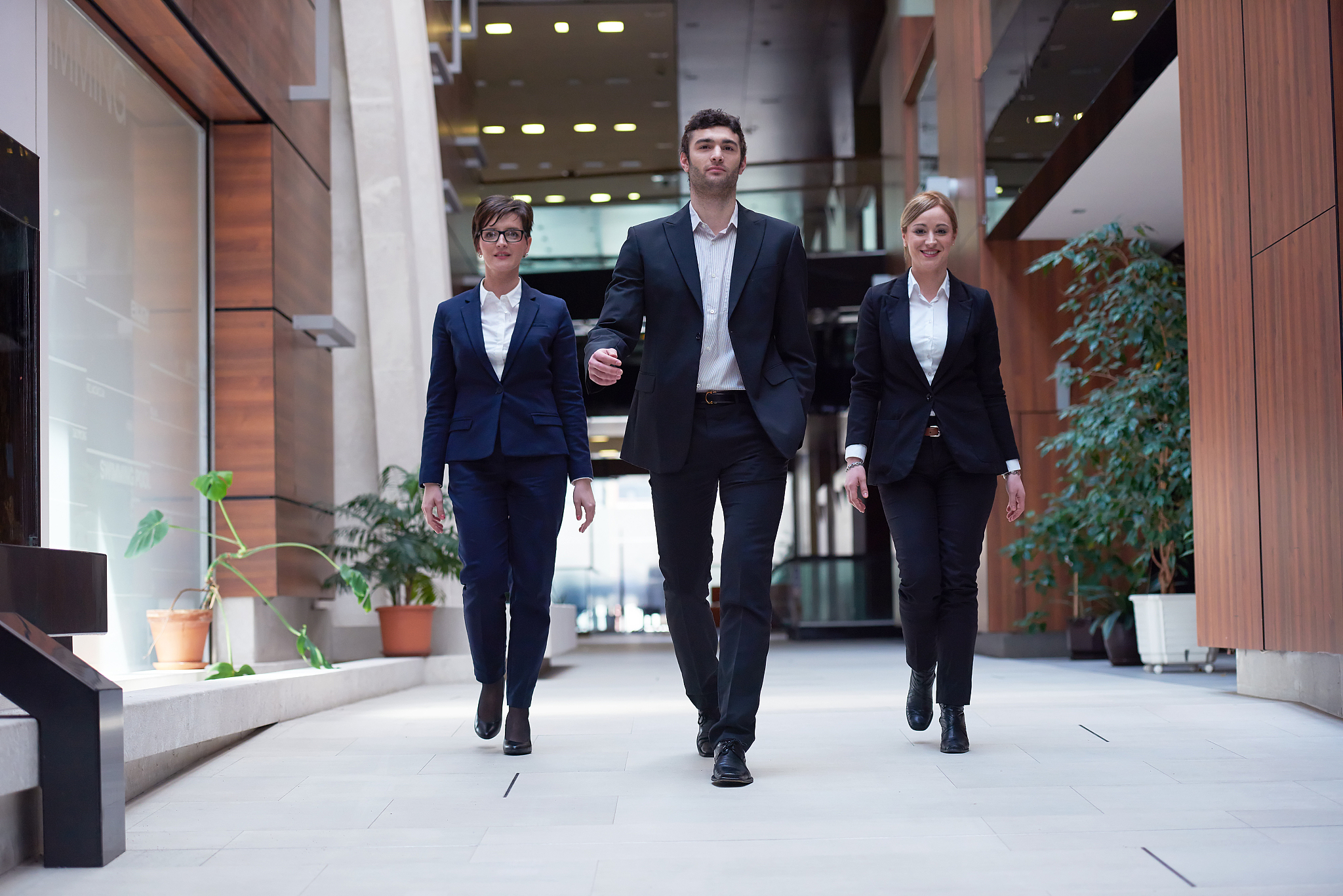 young business people team walking, group of people on modern of