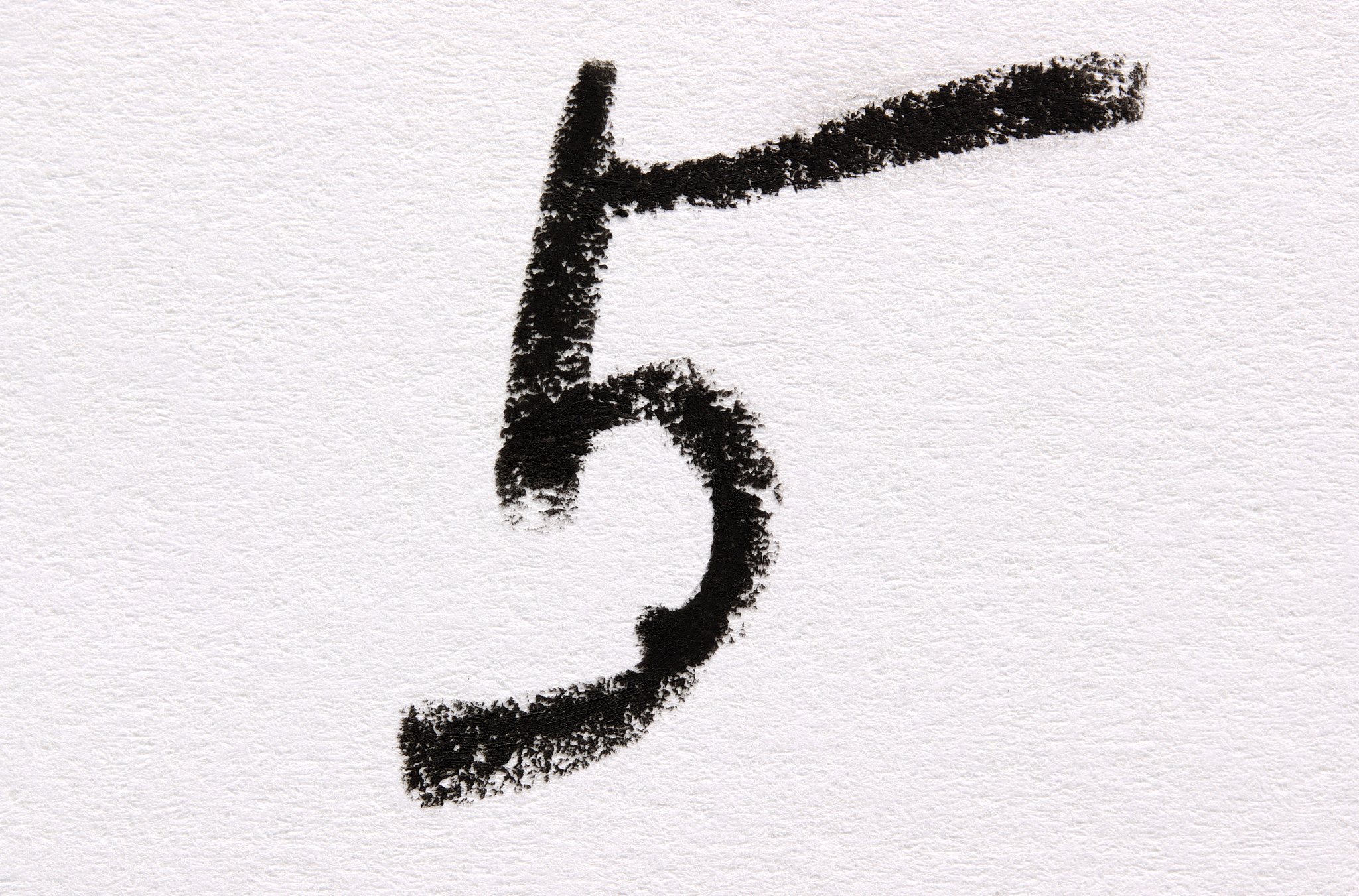 number five made of black and white crayon