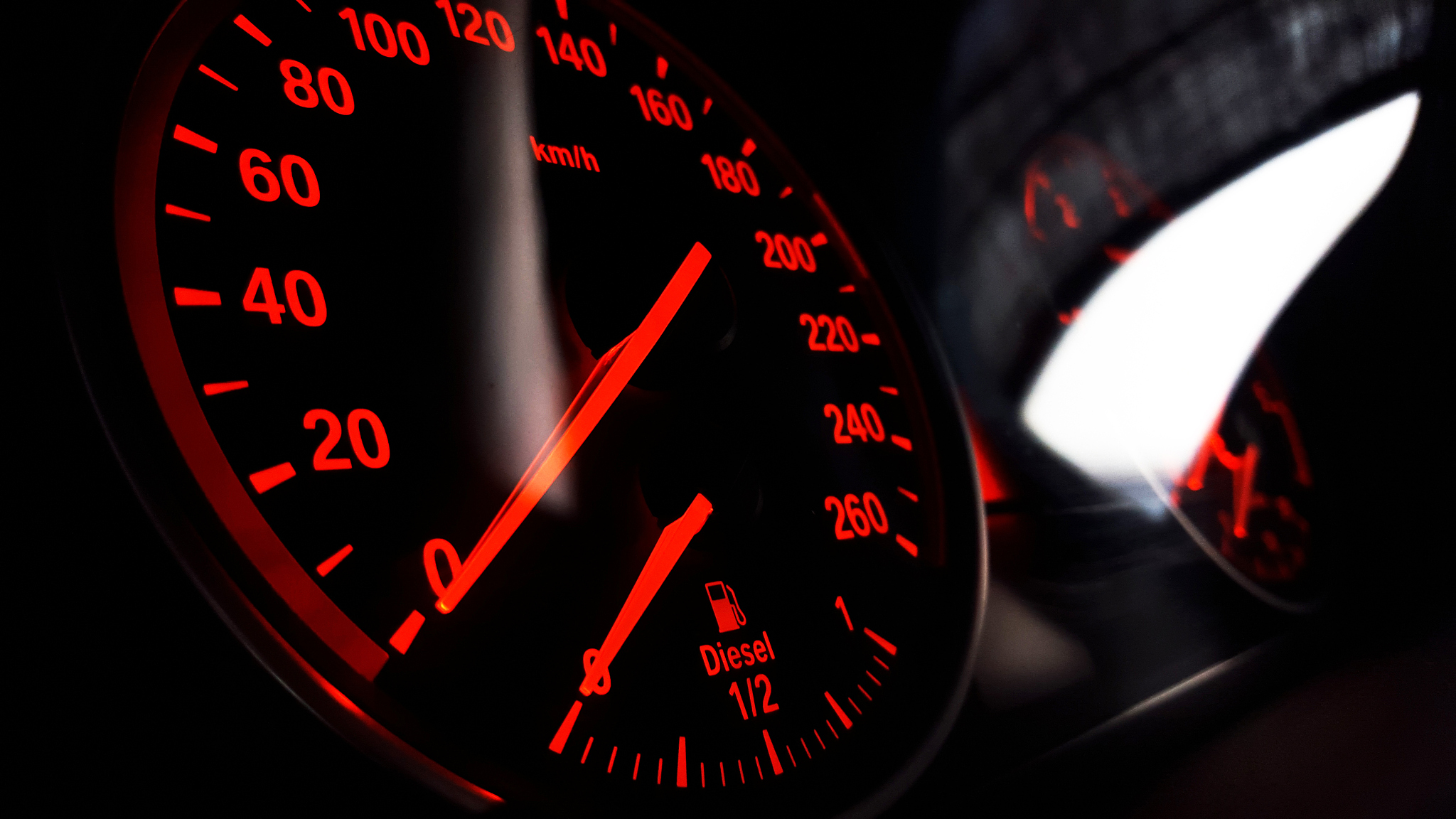 orange car speedometer