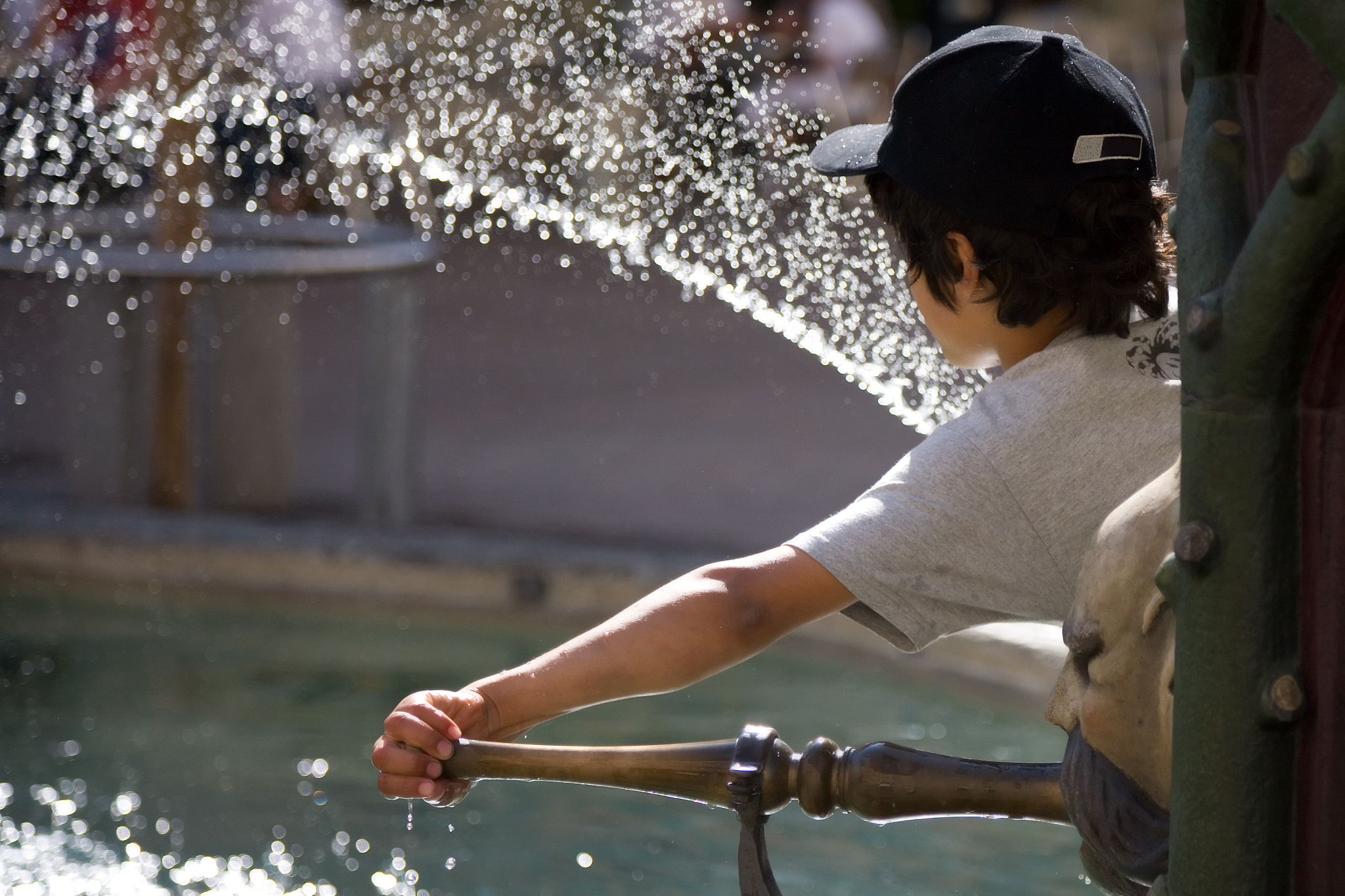 boy playing with water
