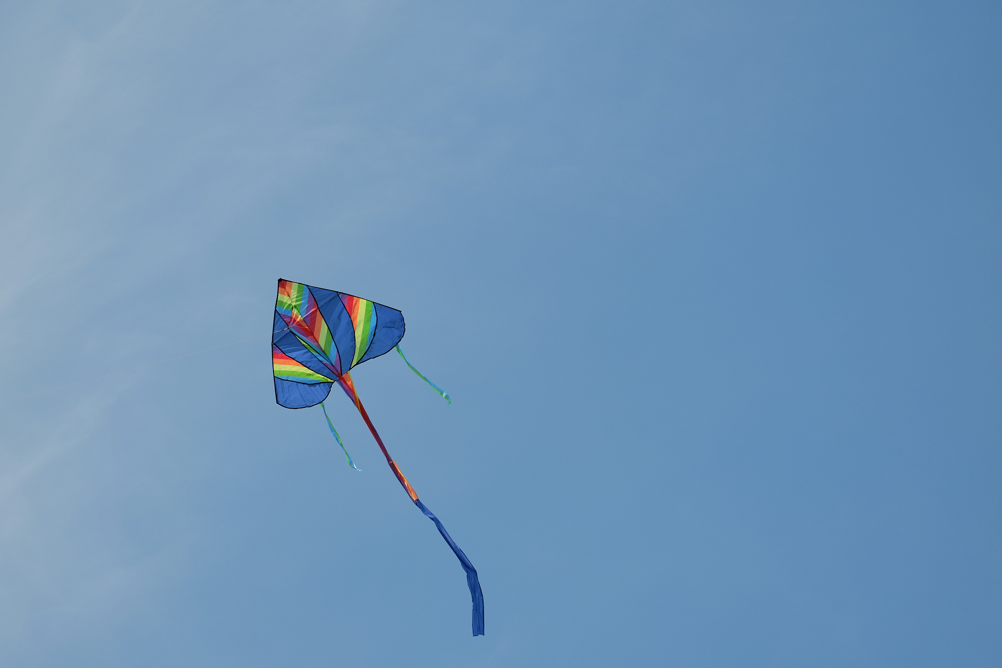 low angle view of kite against clear blue sky