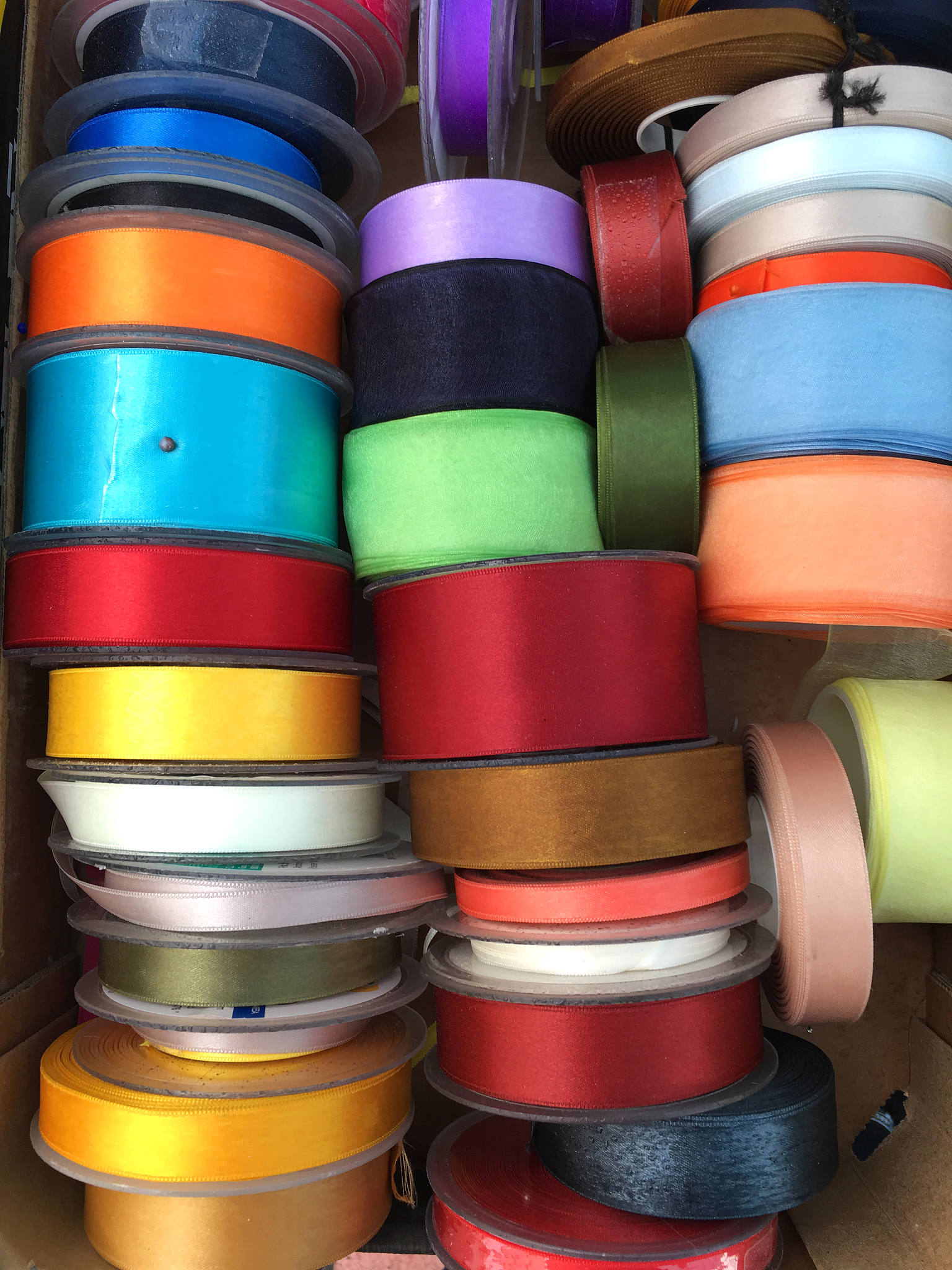 close-up of colorful ribbons for sale