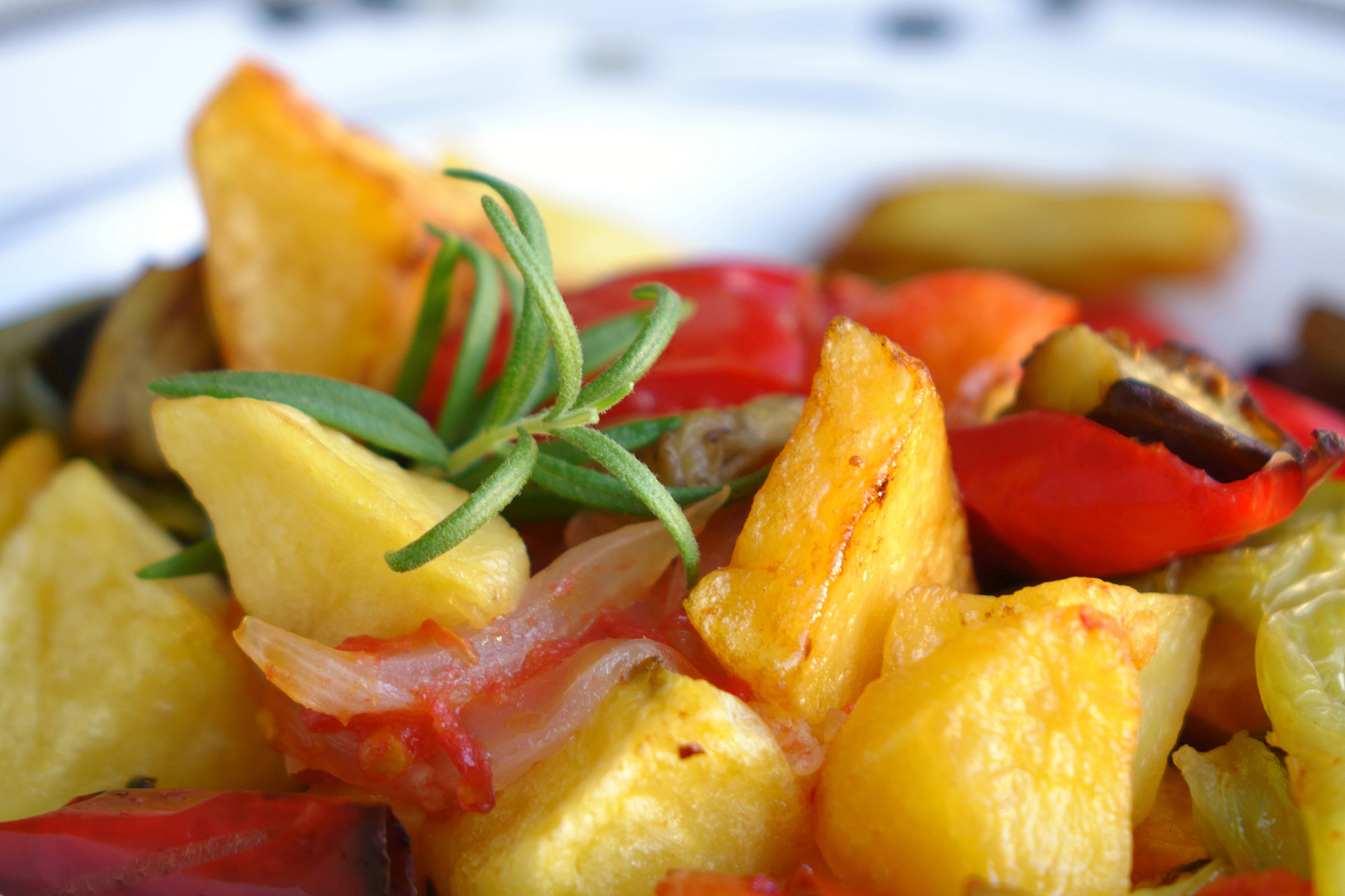 ratatouille made of potatoes, eggplant, zucchini, tomato and pep