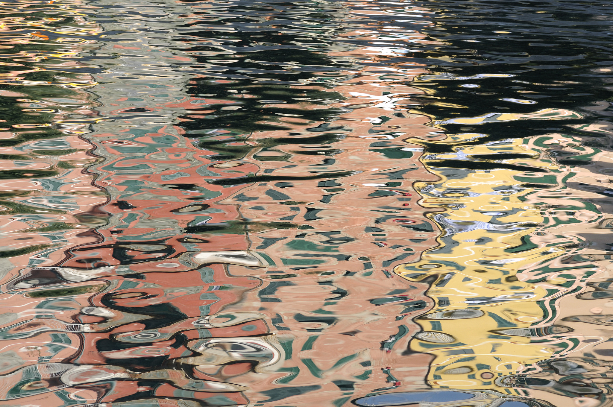abstract reflection of colorful buildings in vernazza, cinque te