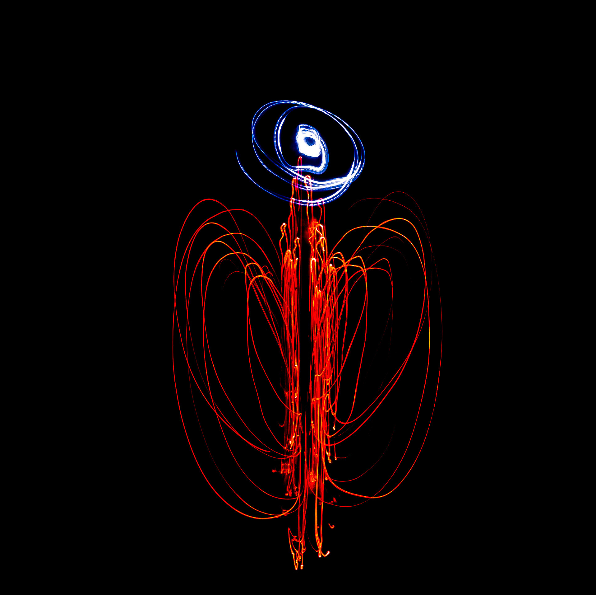 person performing with wire wool in dark