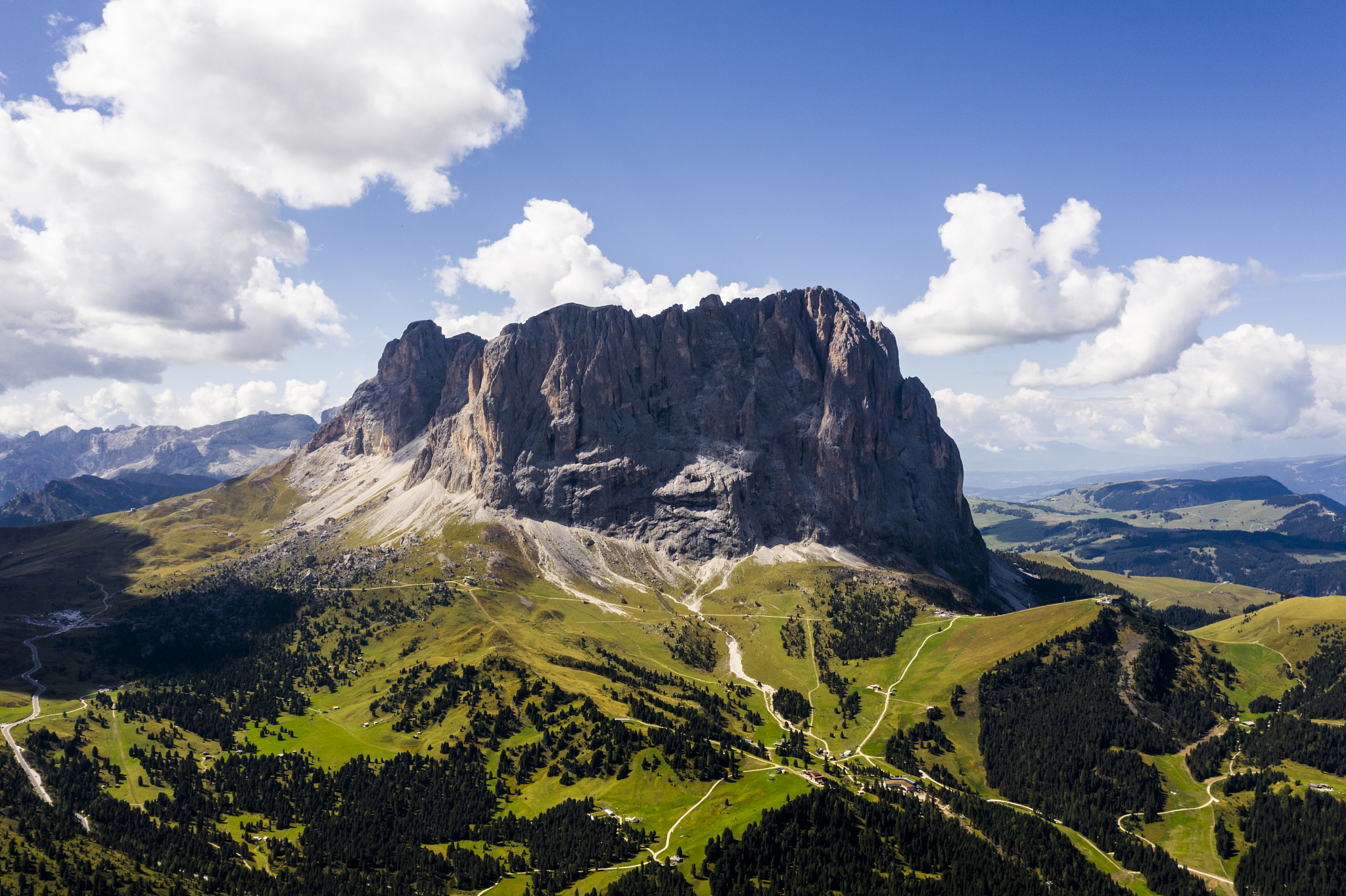 aerial view of sassolungo in the dolomites