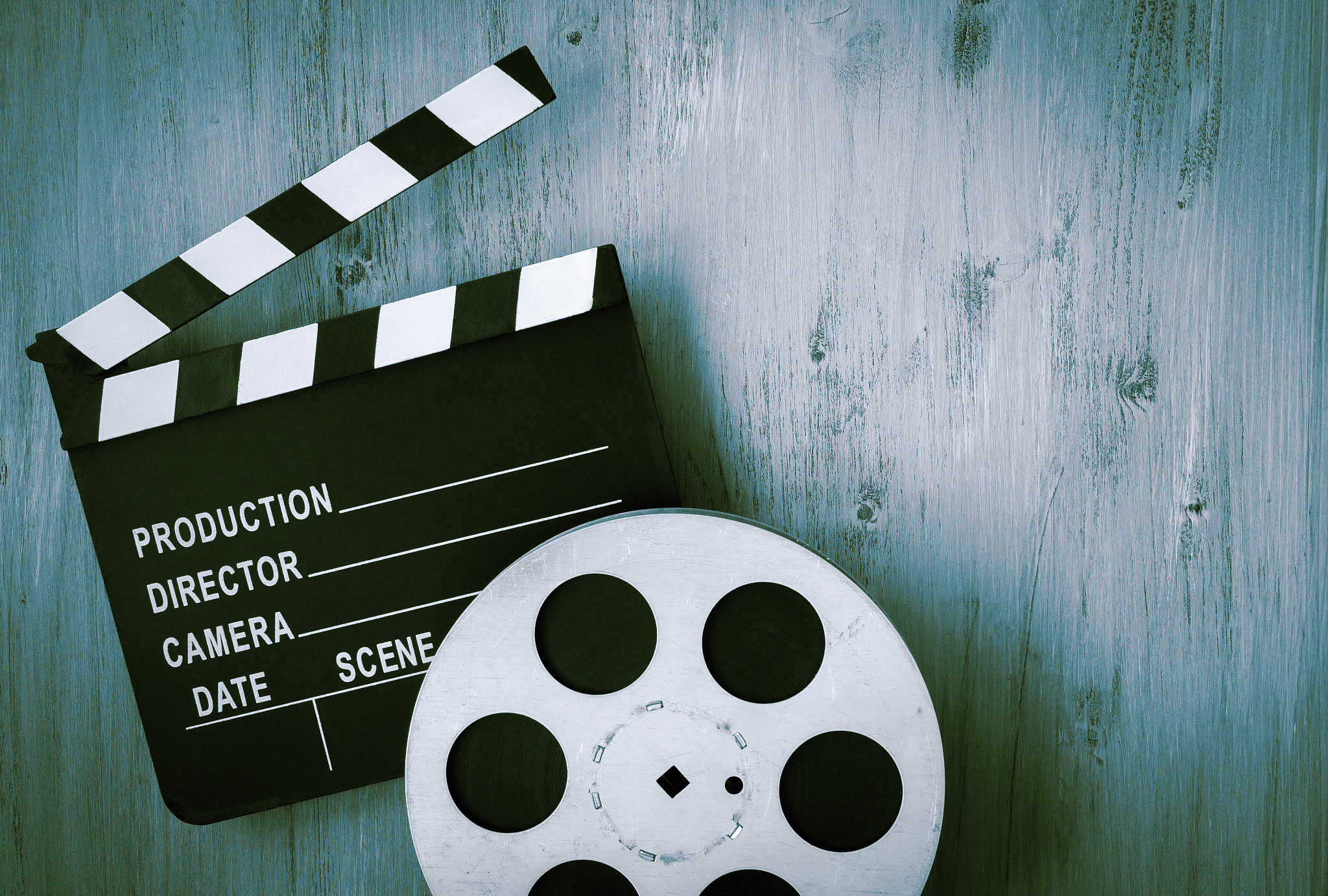 clapperboards and the reel of film
