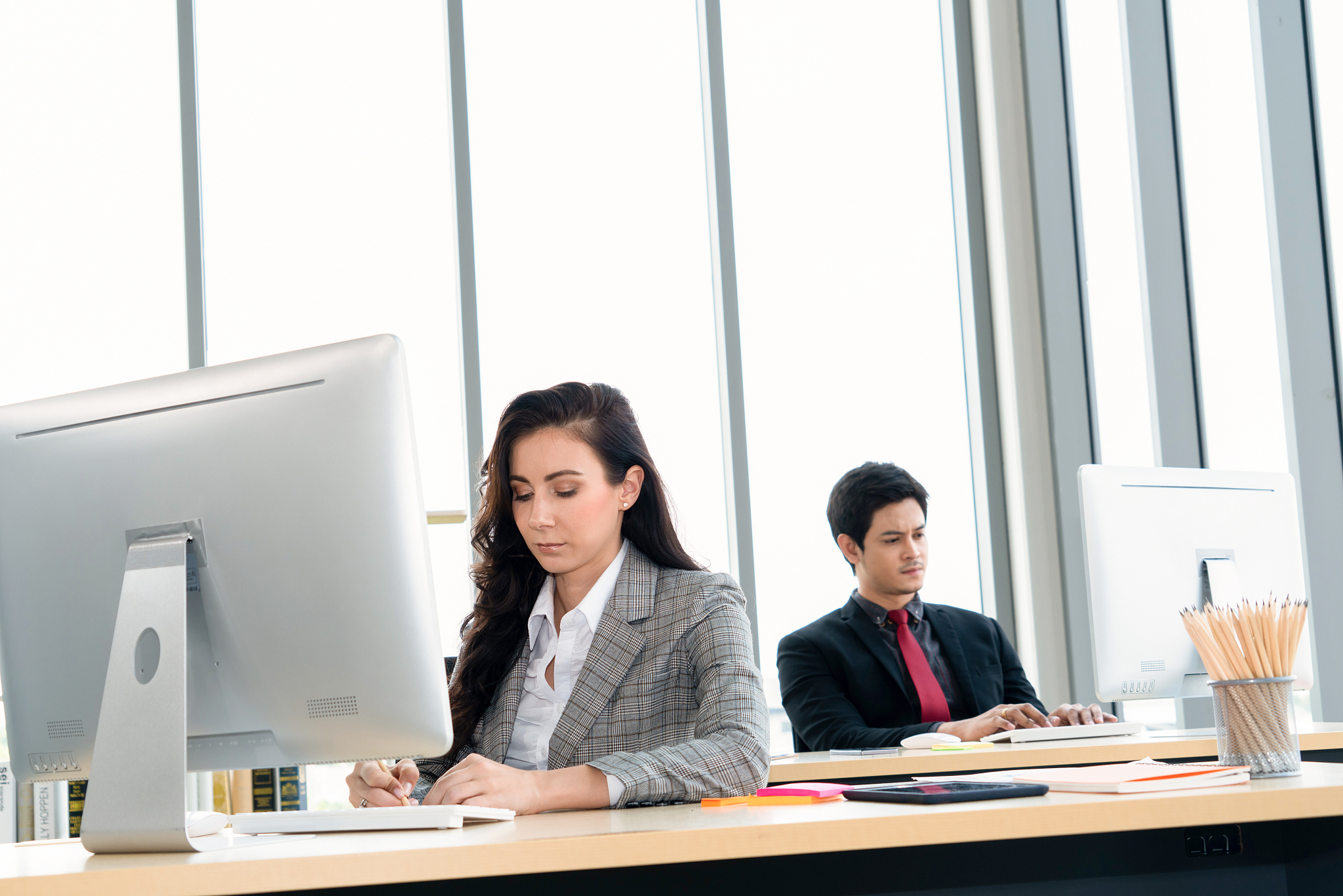 business people working at table in modern office