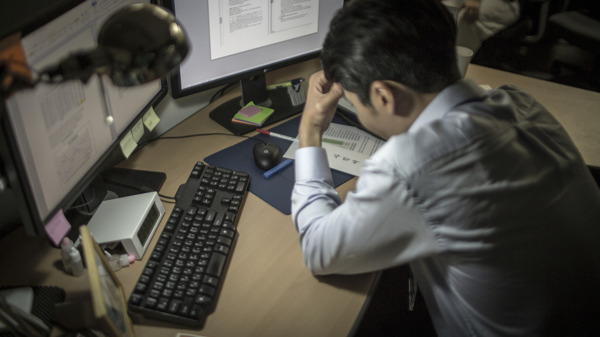 photography of businessman thinking quitting a job
