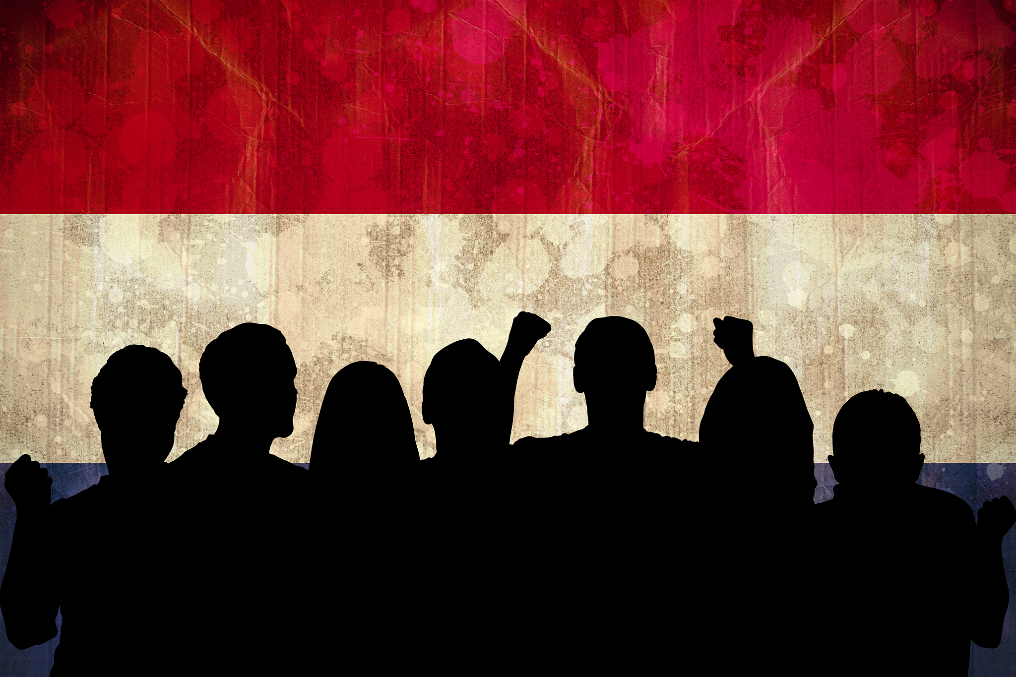 silhouettes of football supporters