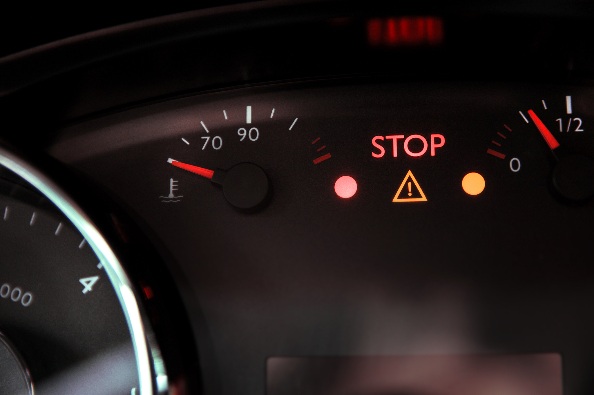 warning triangle light and 'stop' ignite on dashboard